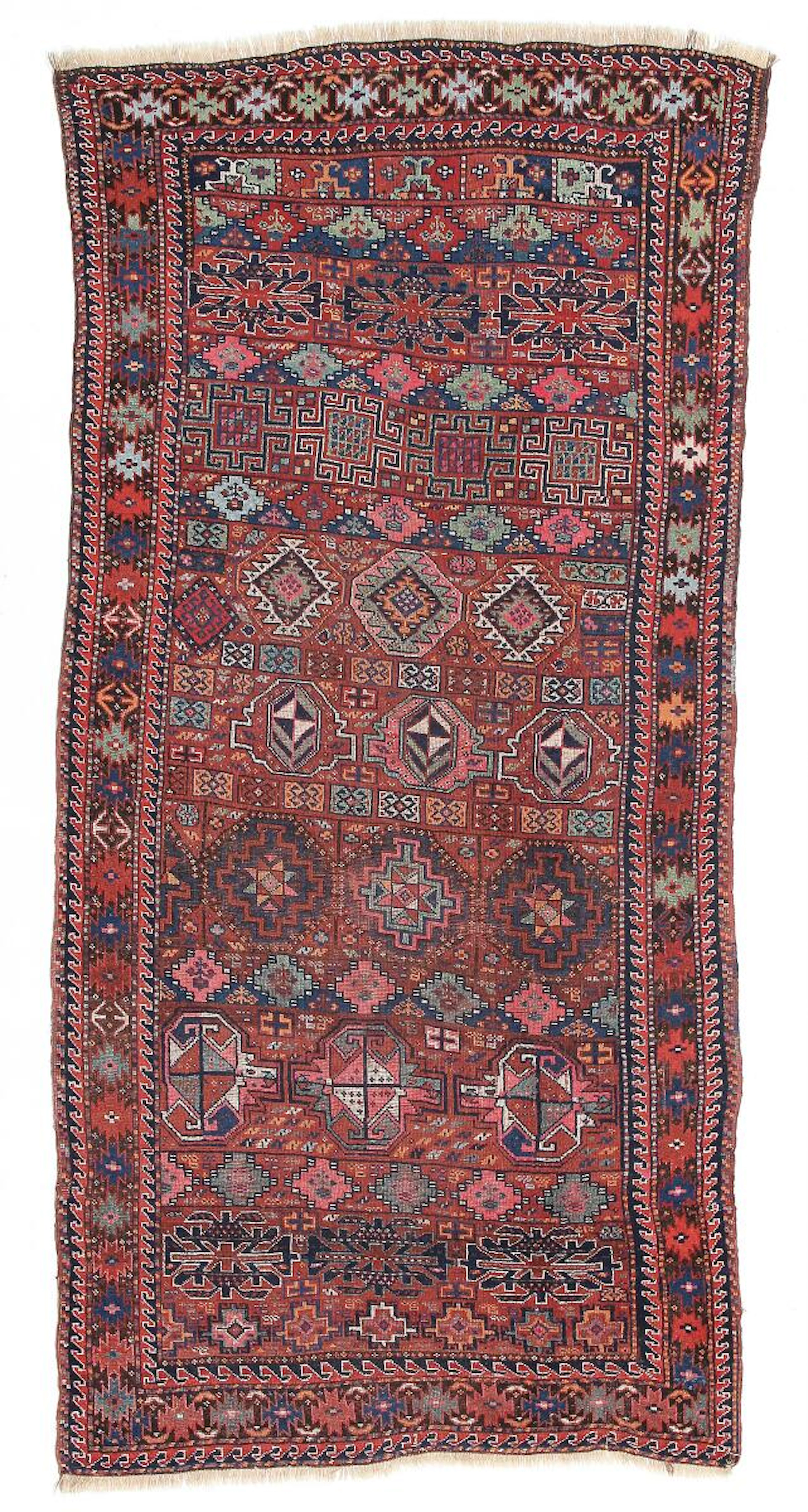 A semiantique Kurdish rug. Memling gül design. Early 20th century. 268×130 cm.