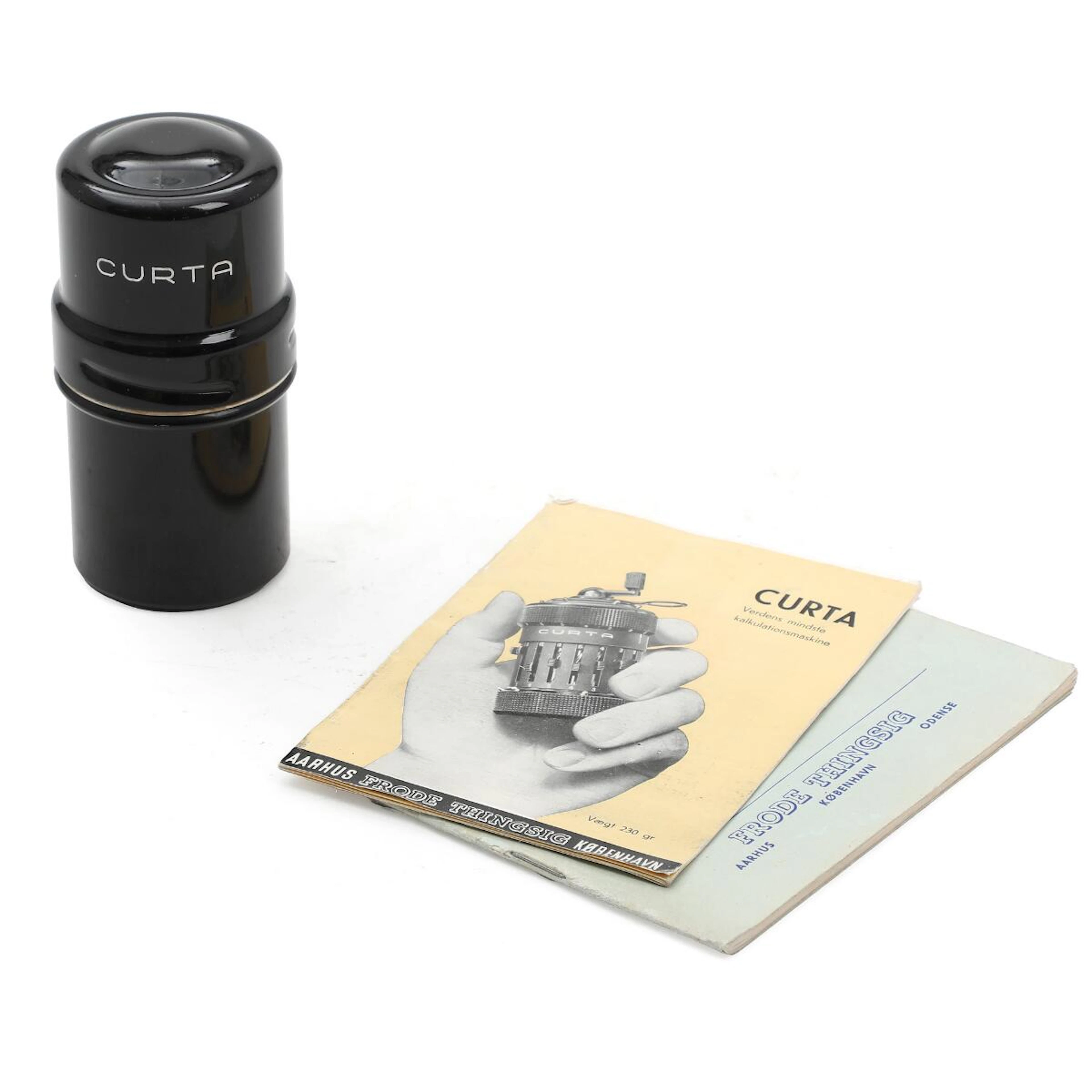 Curta mechanical calculator in box