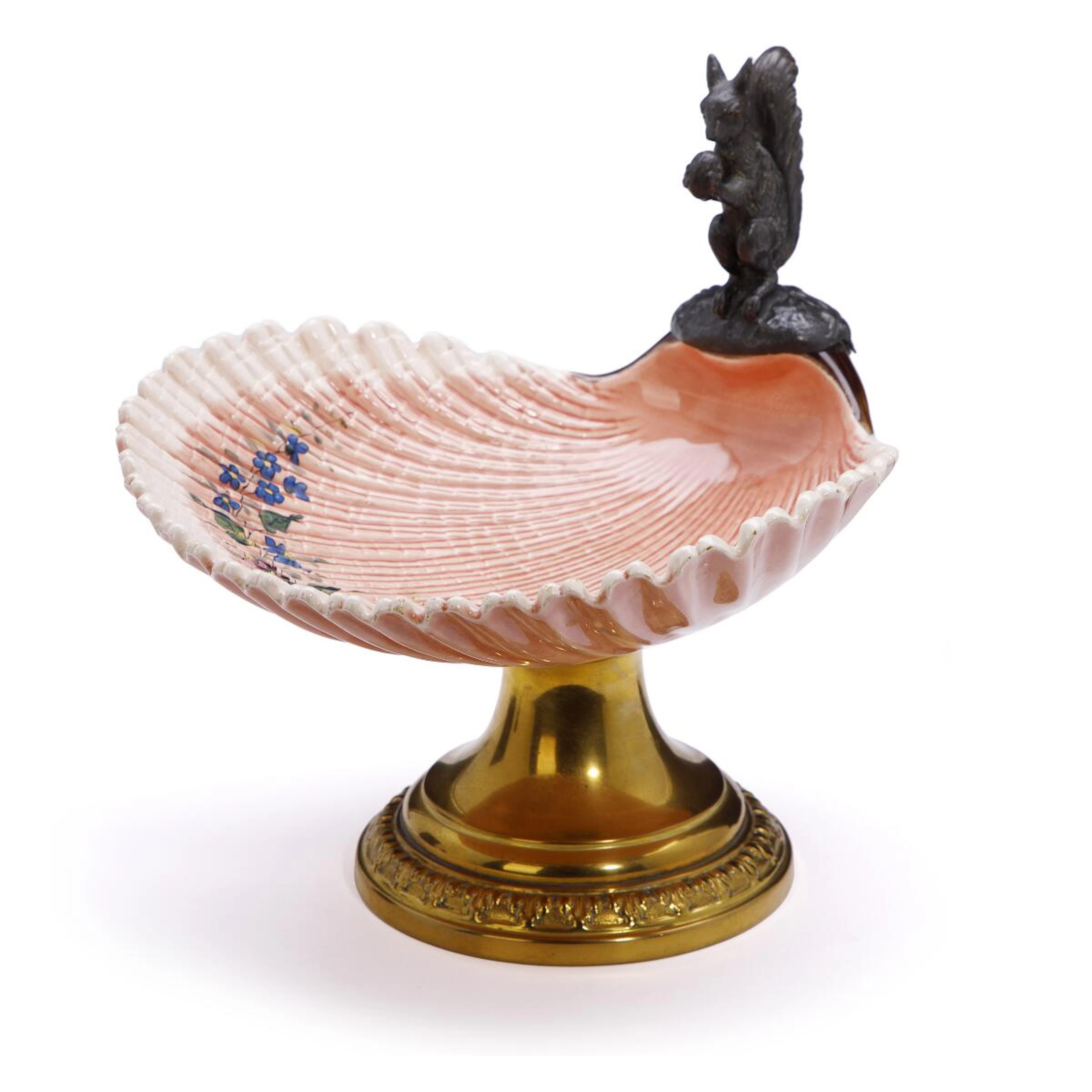 A French majolica tazza of shell shape on brass base...