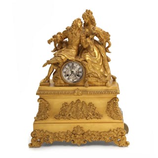 A French Louis Philipppe partly gilt bronze mantel clock