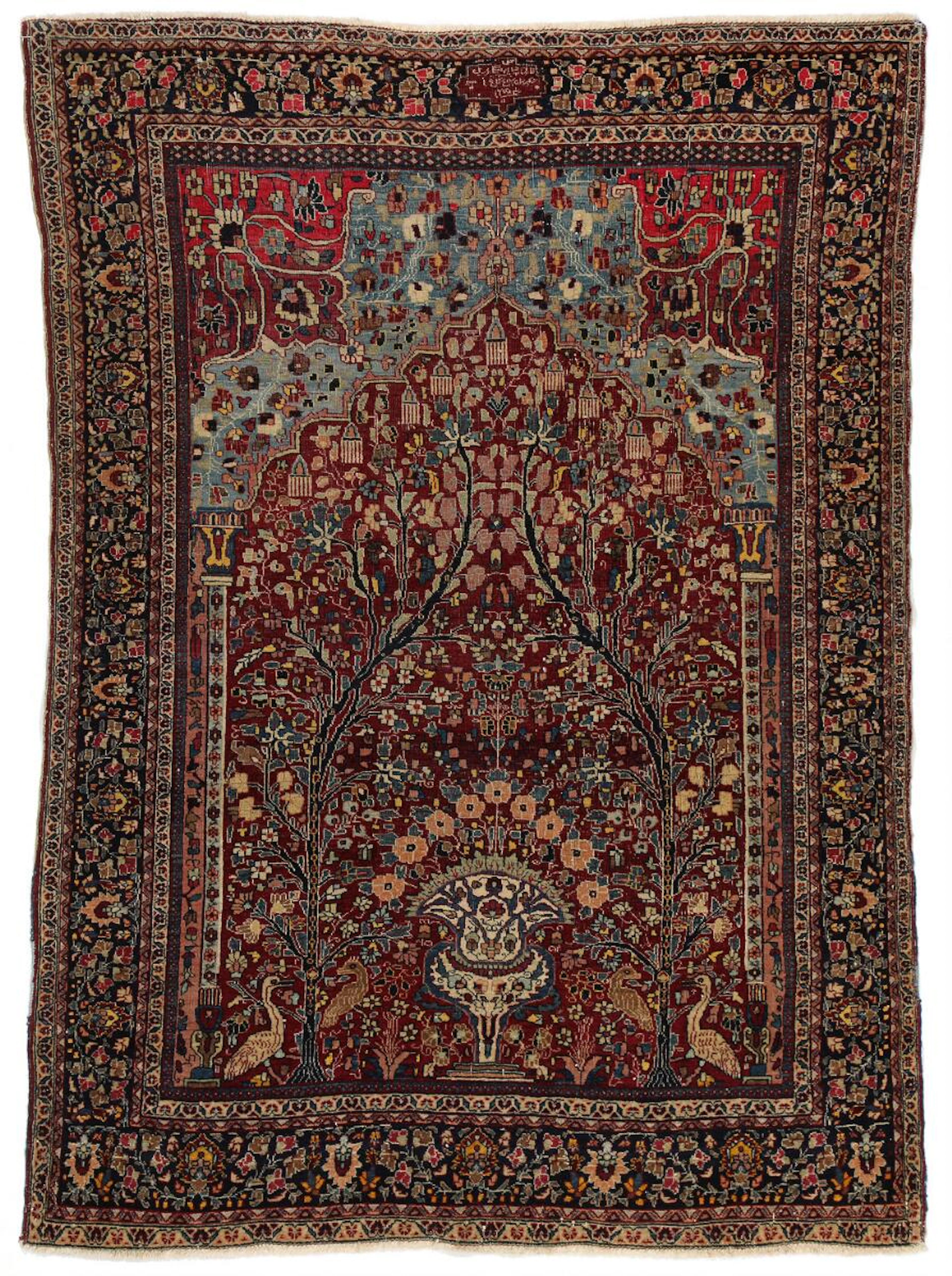 A signed Mashad carpet
