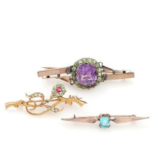 Three Russian brooches respectivly set with amethyst, green garnet