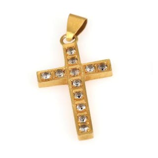 A pendant in the shape of a cross set with numerous white faceted