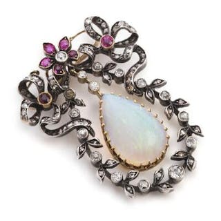An opal, ruby and diamond pendant set with a cabochon opal seven rubies