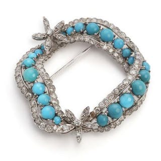 A turquoise and diamond brooch in the shape of a wreath set with numerous