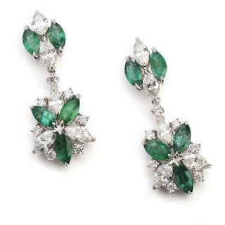 A pair of emerald and diamond ear pendants each set with numerous