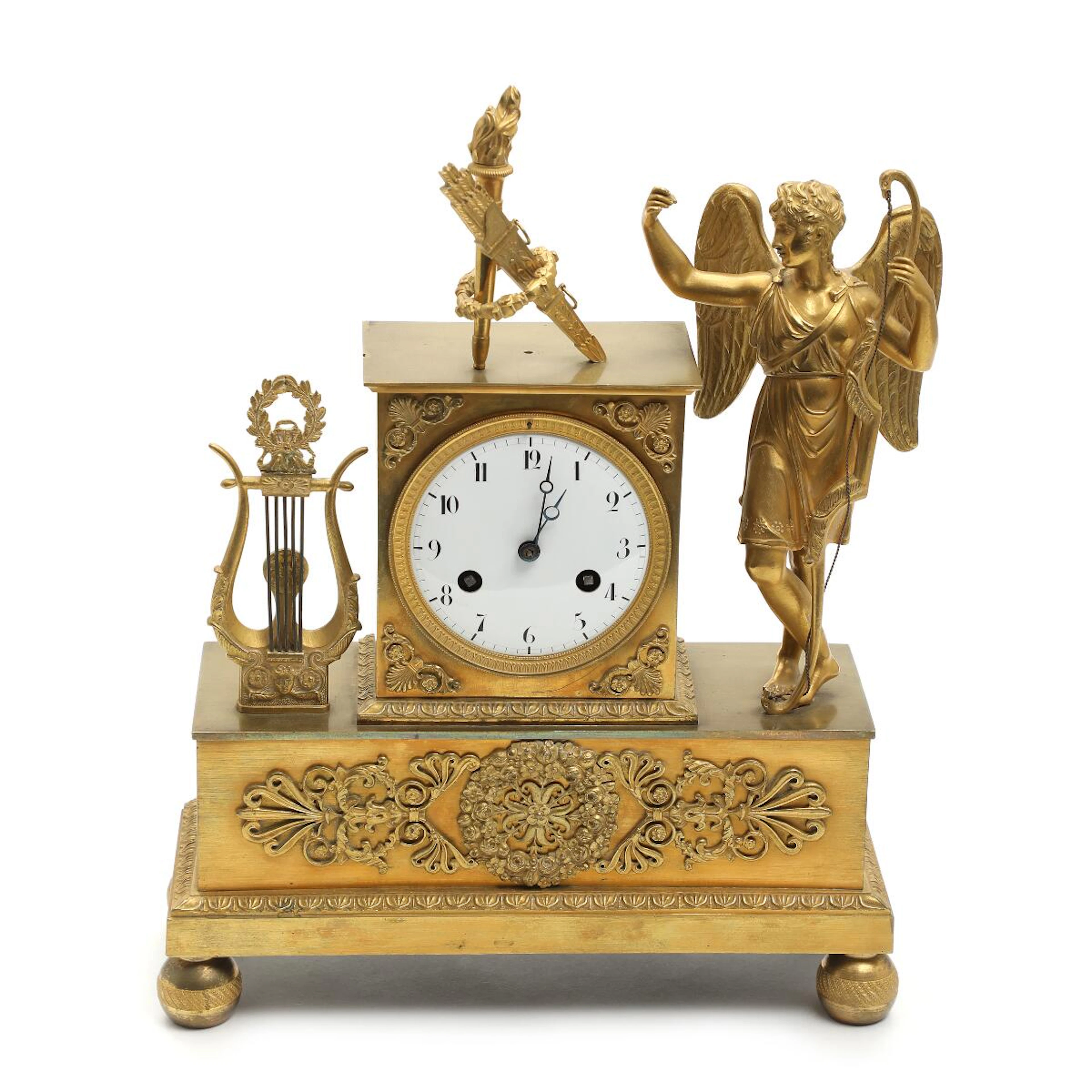 An early 19th century French figural mantel clock adorned with Amor