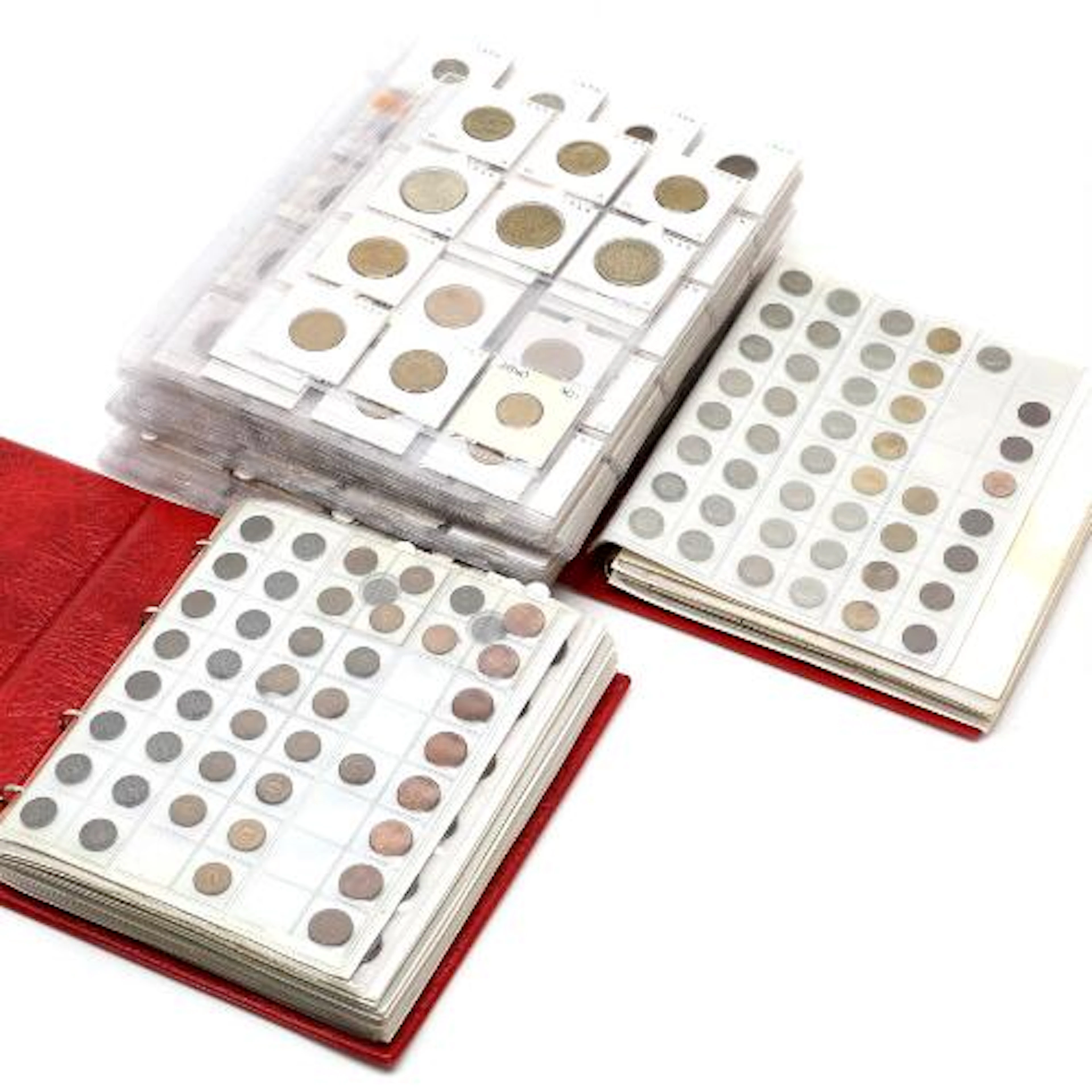 Box with 2 albums and various loose plastic pages with coins from Belgium