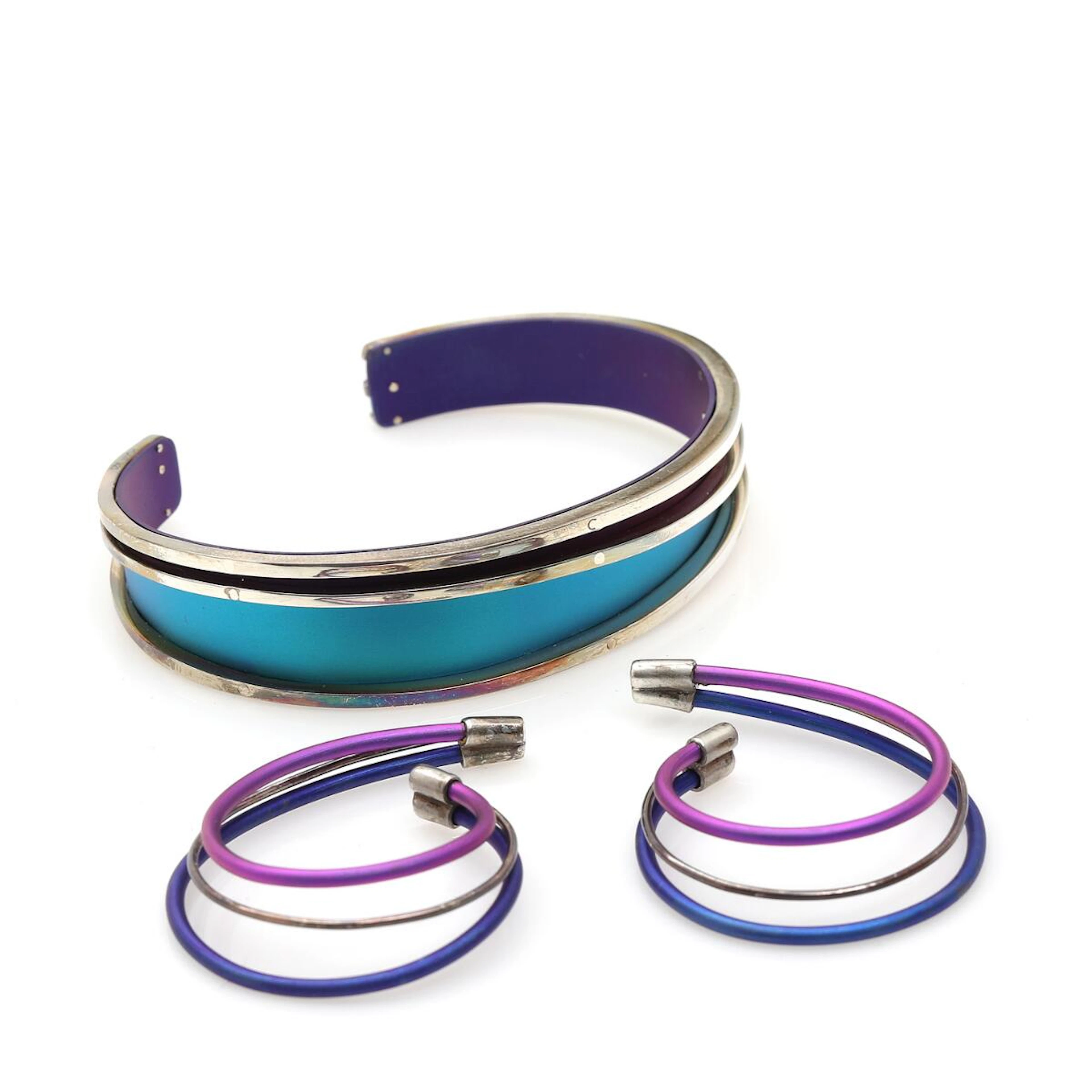 Kirsten Pontoppidan: A sterling silver and colour oxidized titanium