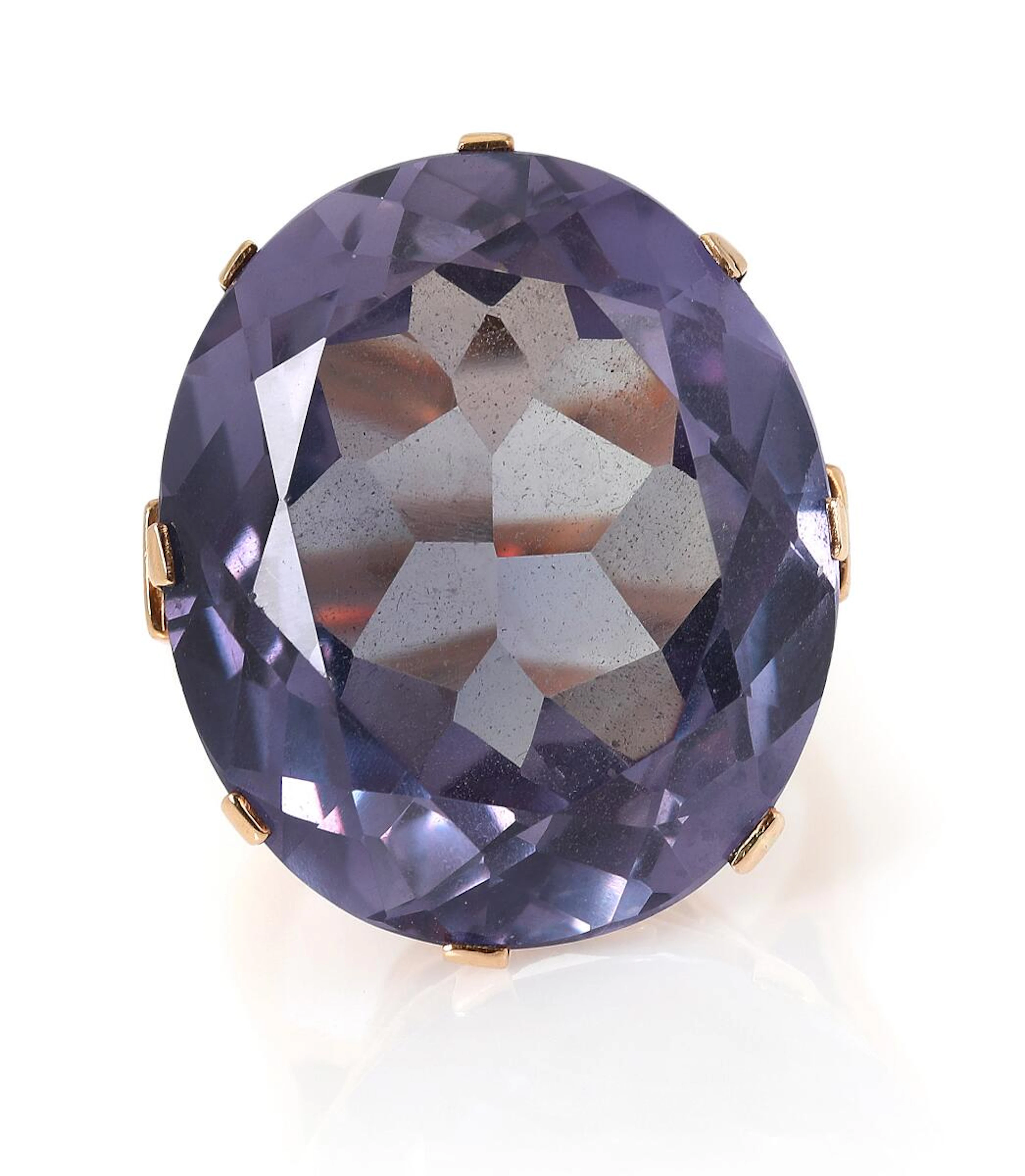 A sapphire ring set with an oval-cut syntetic sapphire