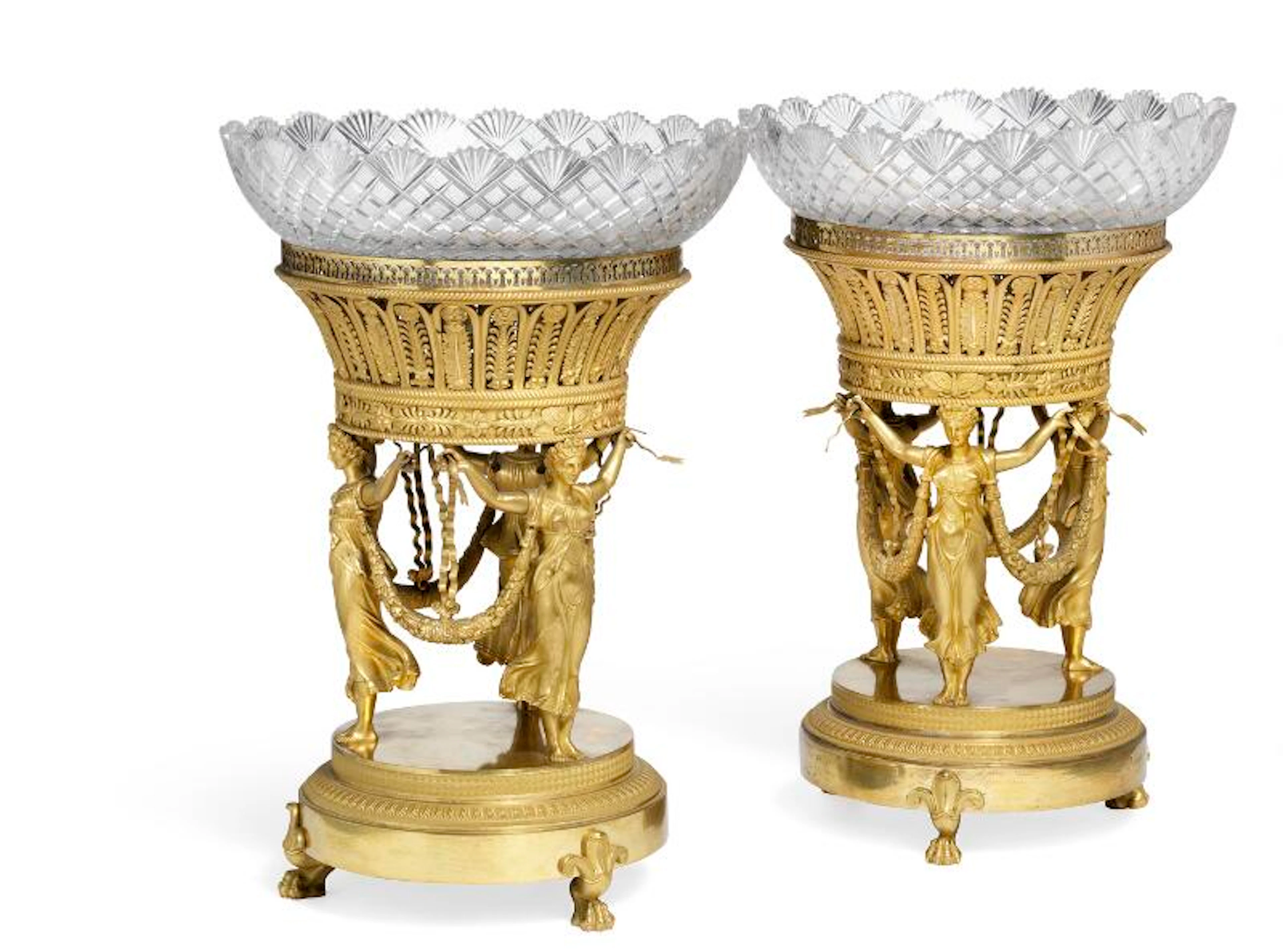 A pair of Empire gilt bronze centerpieces in the manner...