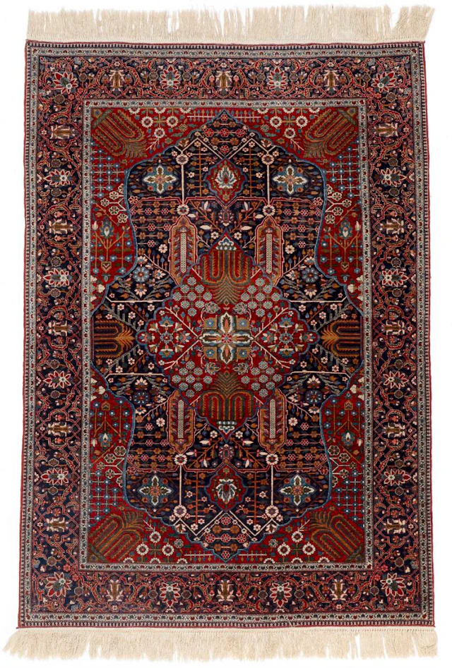 A Kashan Mohtasham rug