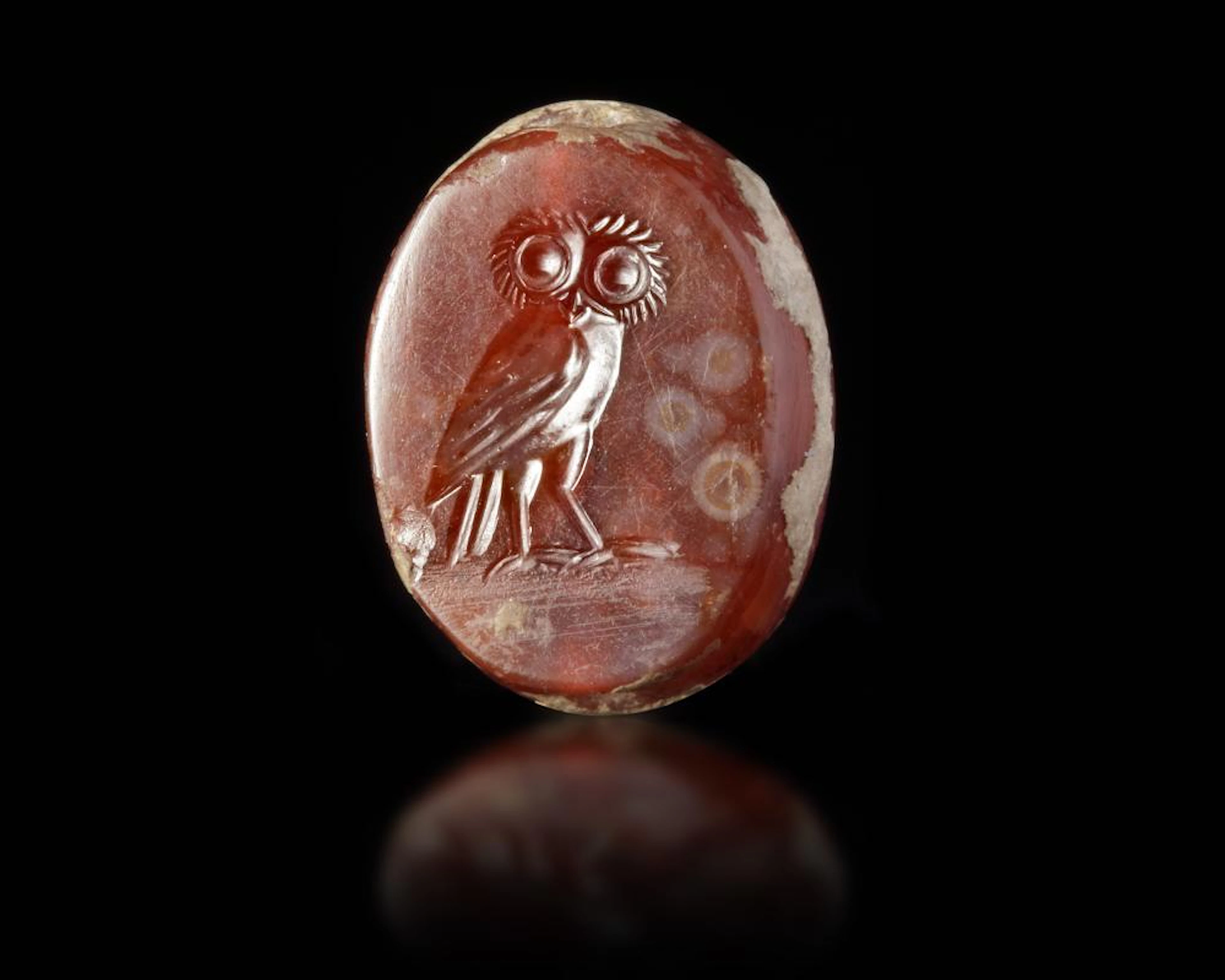 AN EASTERN GREEK SCARABOID SEAL WITH A STANDING OWL, 5-4TH CENTURY BC