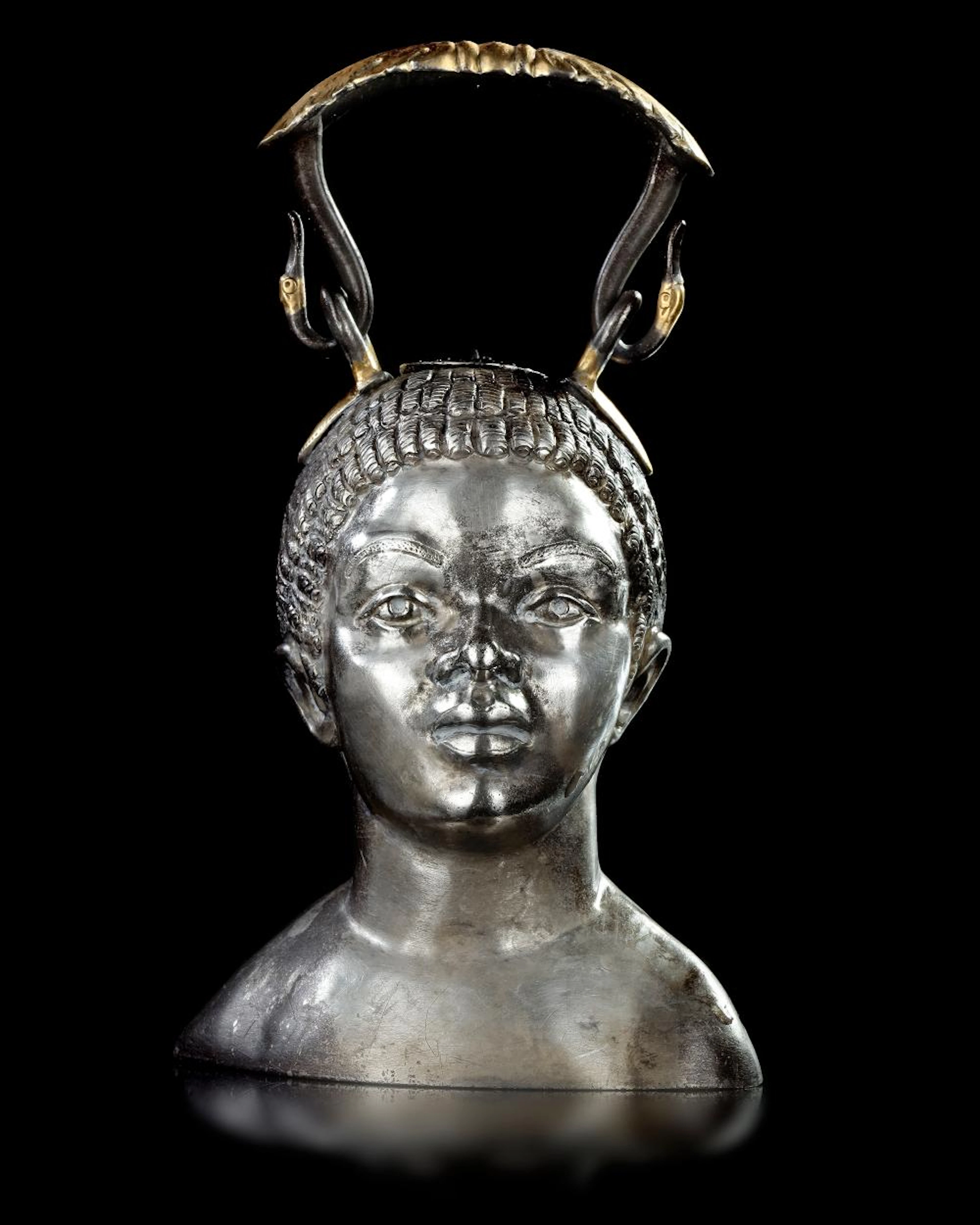 SILVER BALSAMARIUM WITH THE BUST OF A YOUNG AFRICAN, 1ST CENTURY AD