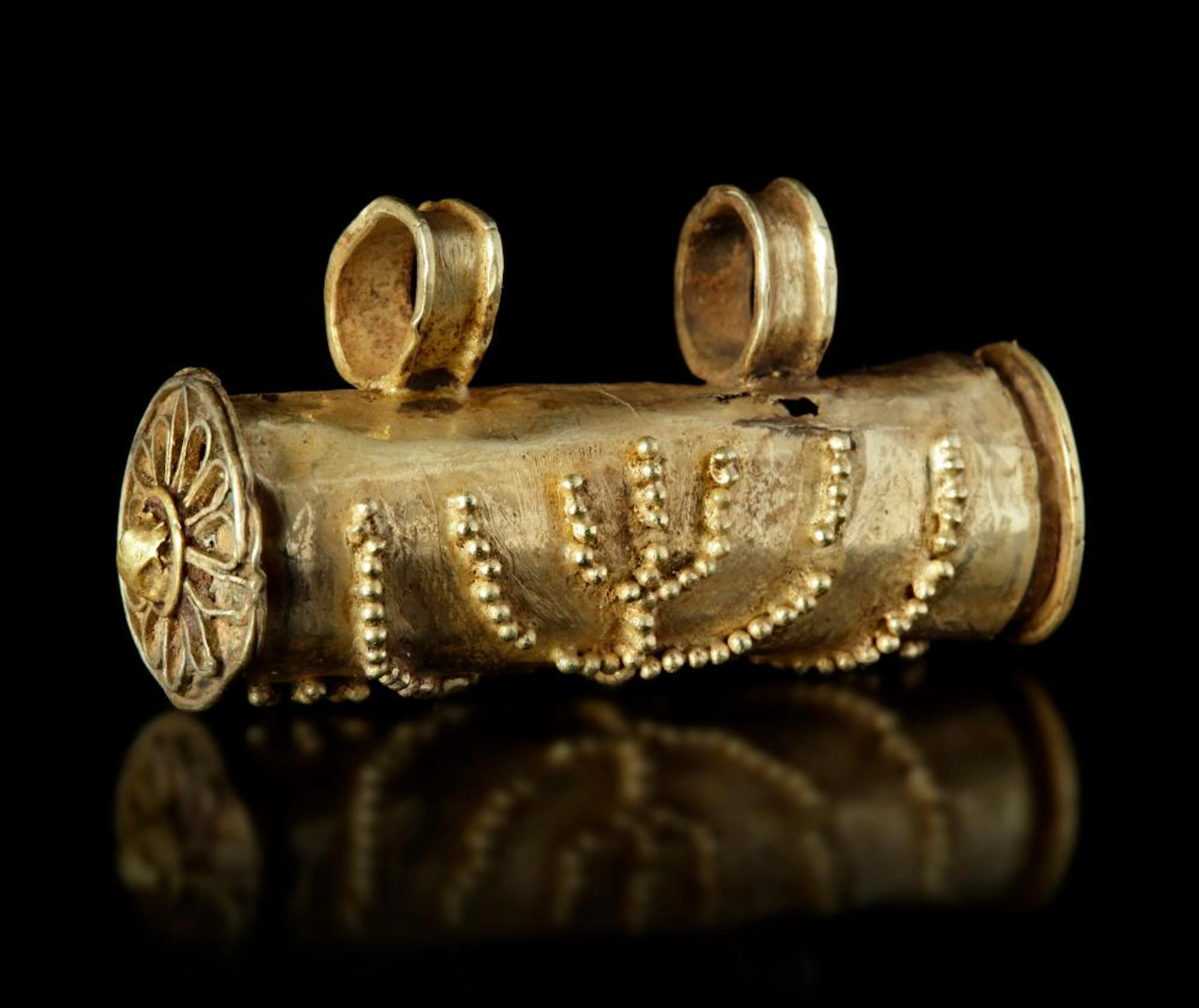 A LATE ROMAN/EARLY BYZANTINE SCROLL/AMULET CASE IN ELECTRUM WITH A MENORAH
