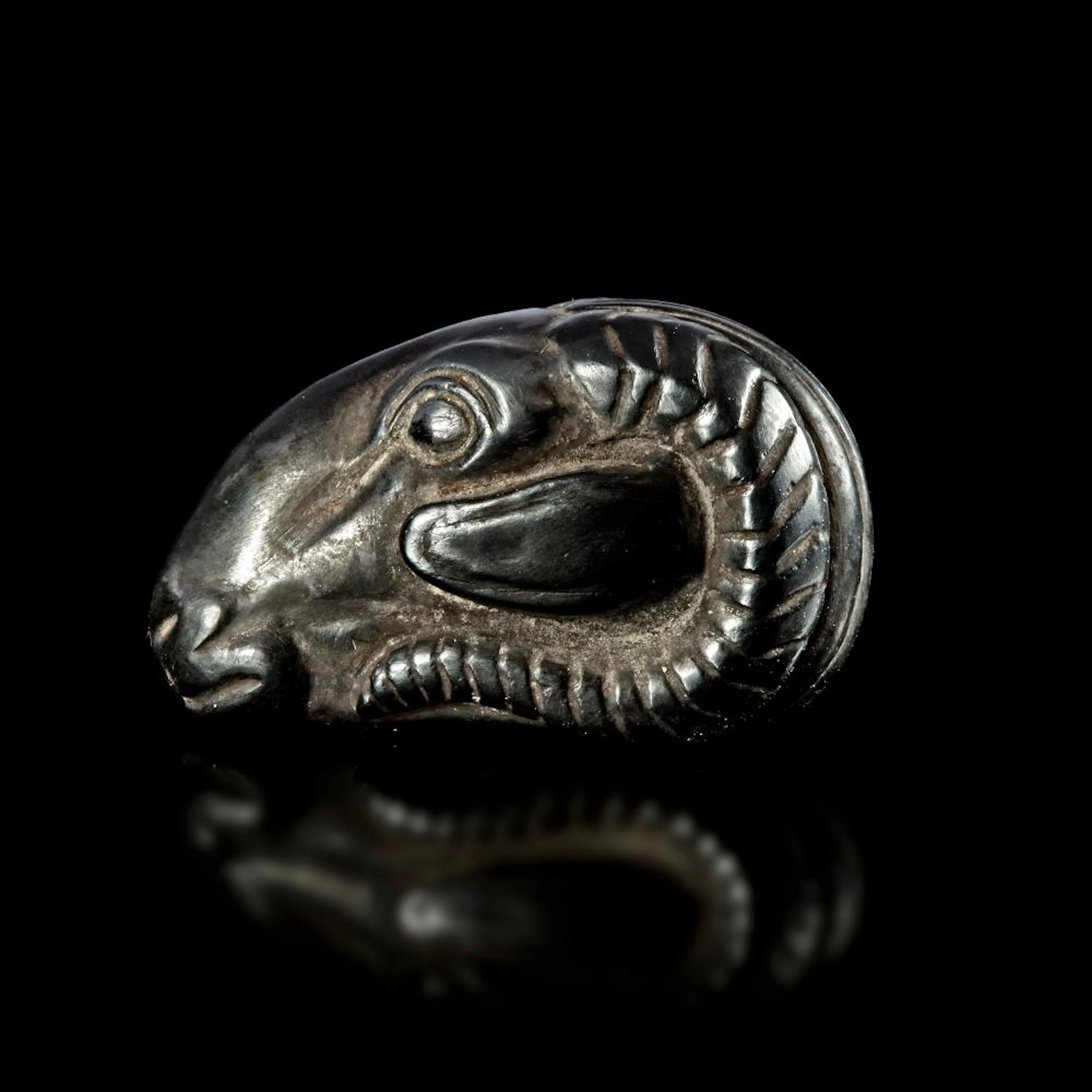 A HIGHLY IMPORTANT HEMATITE WEIGHT OF THREE SHEKELS, 6TH/8TH CENTURY BC
