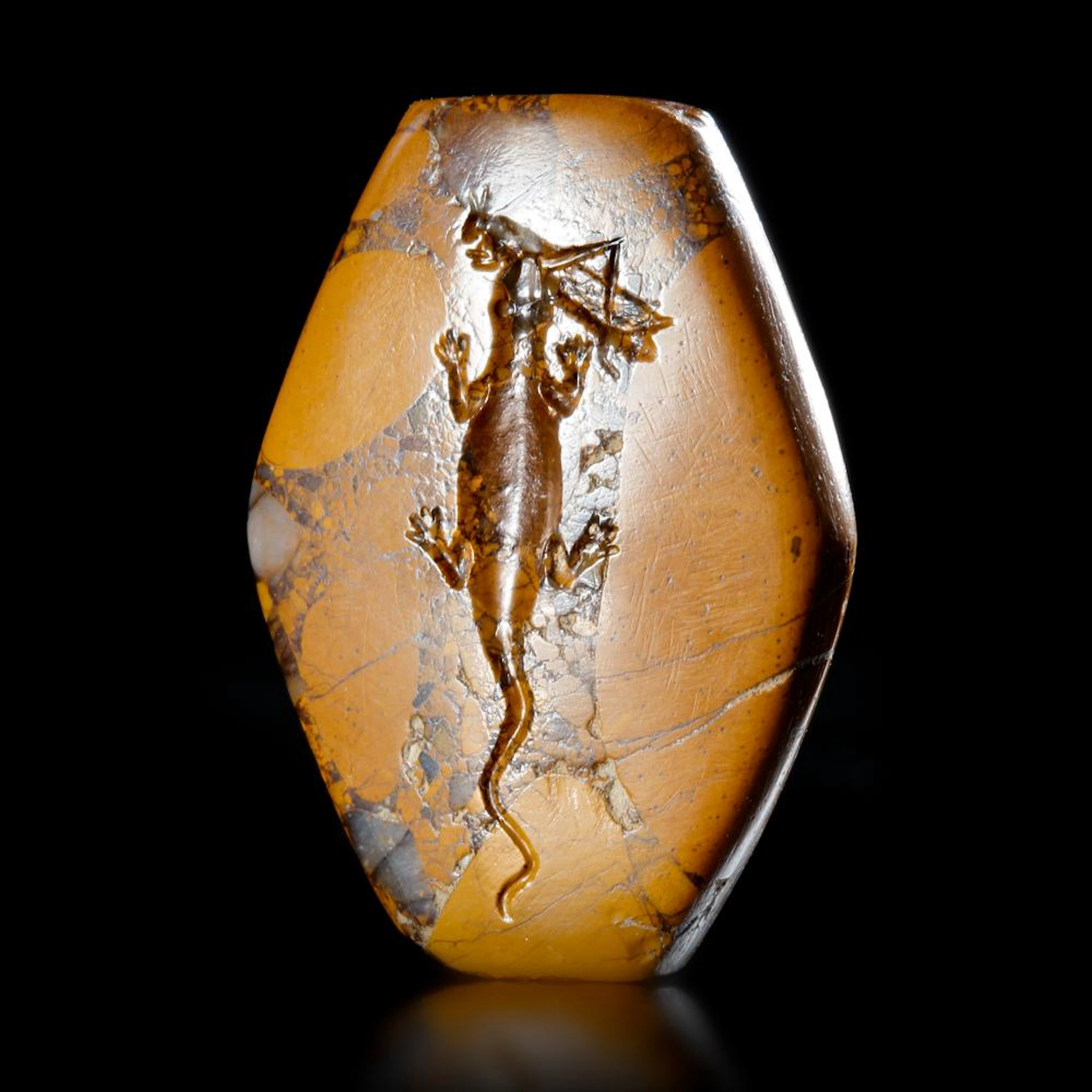 A ROMAN SEAL OF A LIZARD WITH A GRASSHOPPER, 1ST/2ND CENTURY AD