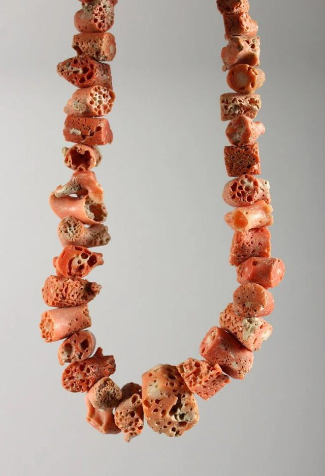 A CORAL NECKLACE.