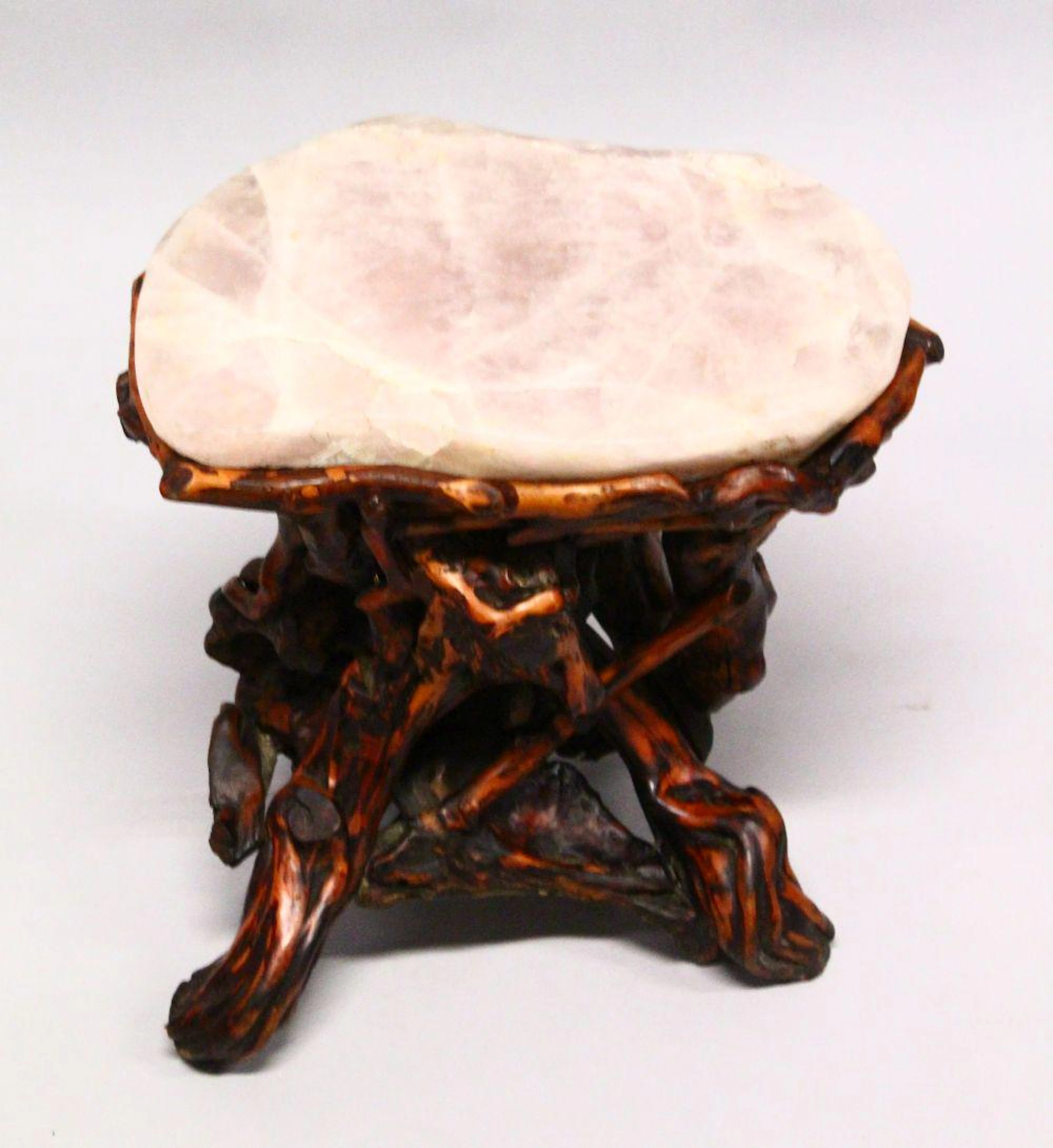 A GOOD CHINESE ROSE QUARTZ TOPPED LOW TABLE, the base
