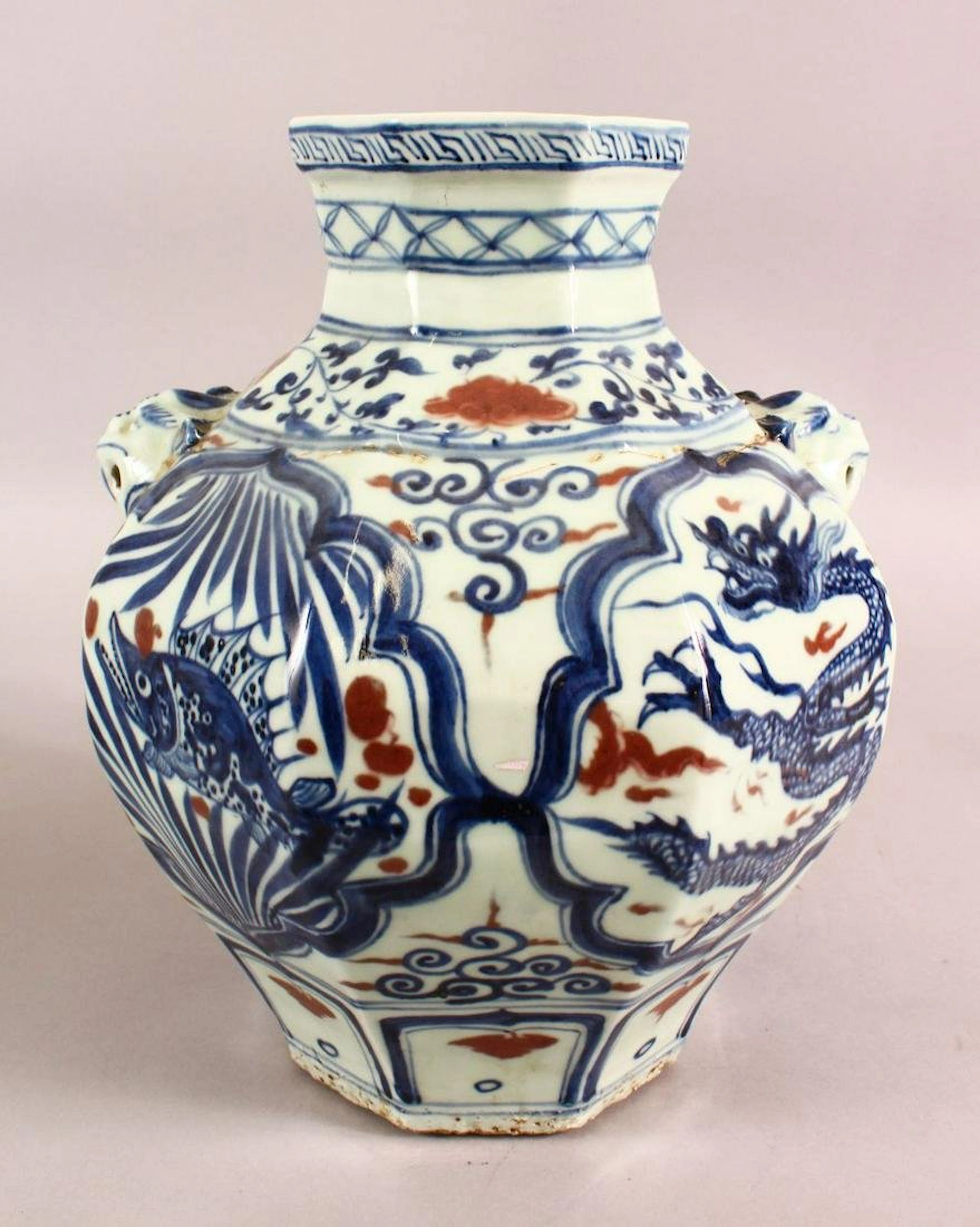A CHINESE BLUE, WHITE AND RED VASE, painted with panels