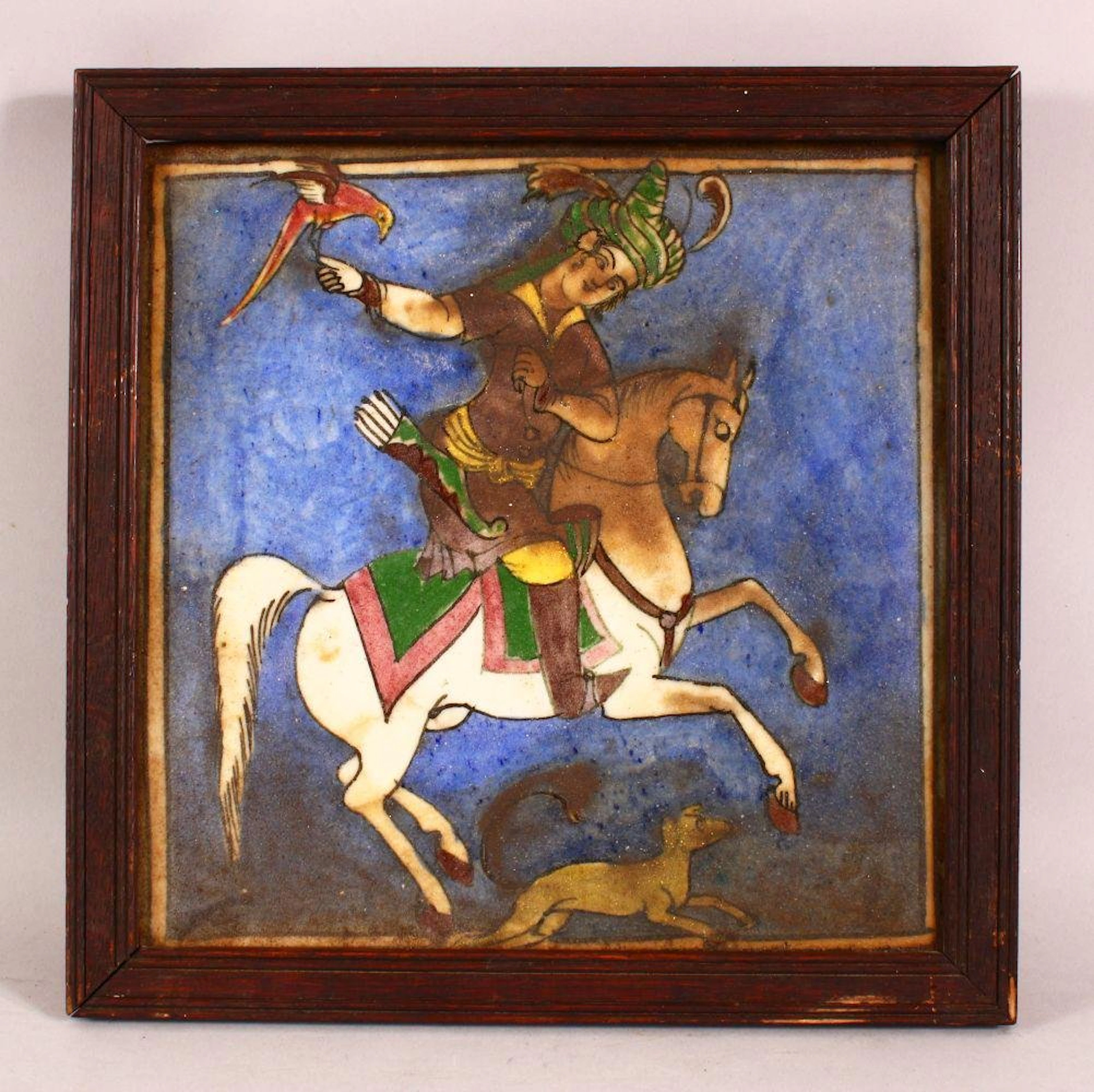 A 19TH CENTURY PERSIAN PORCELAIN TILE PANEL - depicting