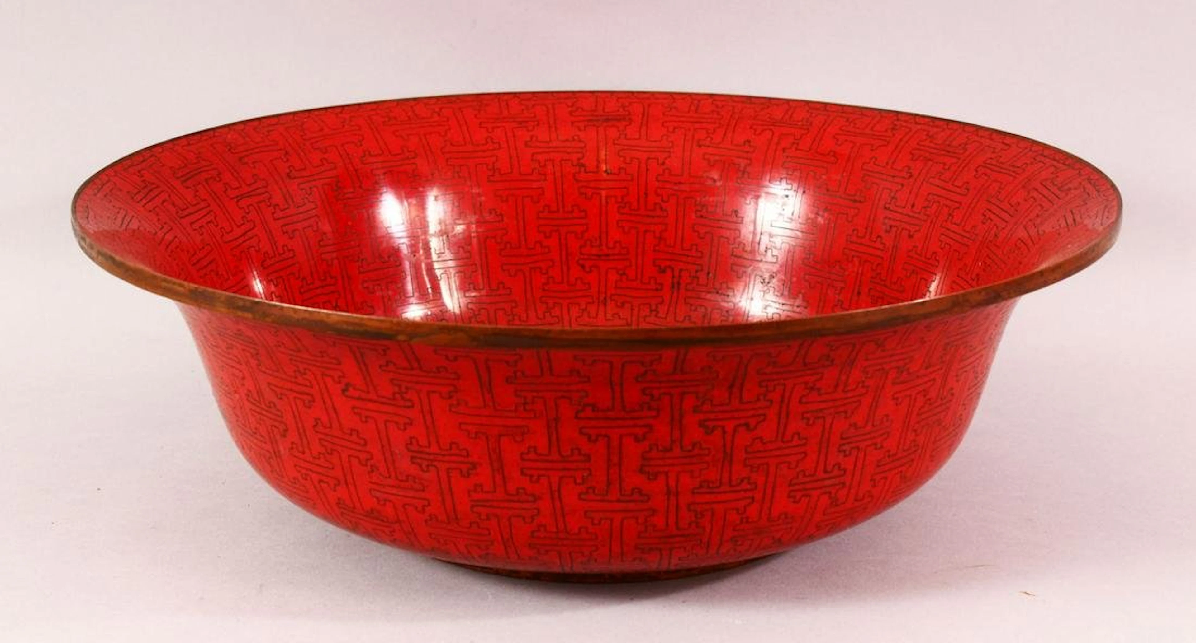 A LARGE CHINESE RED GROUND CLOISONNE BOWL, 38cm
