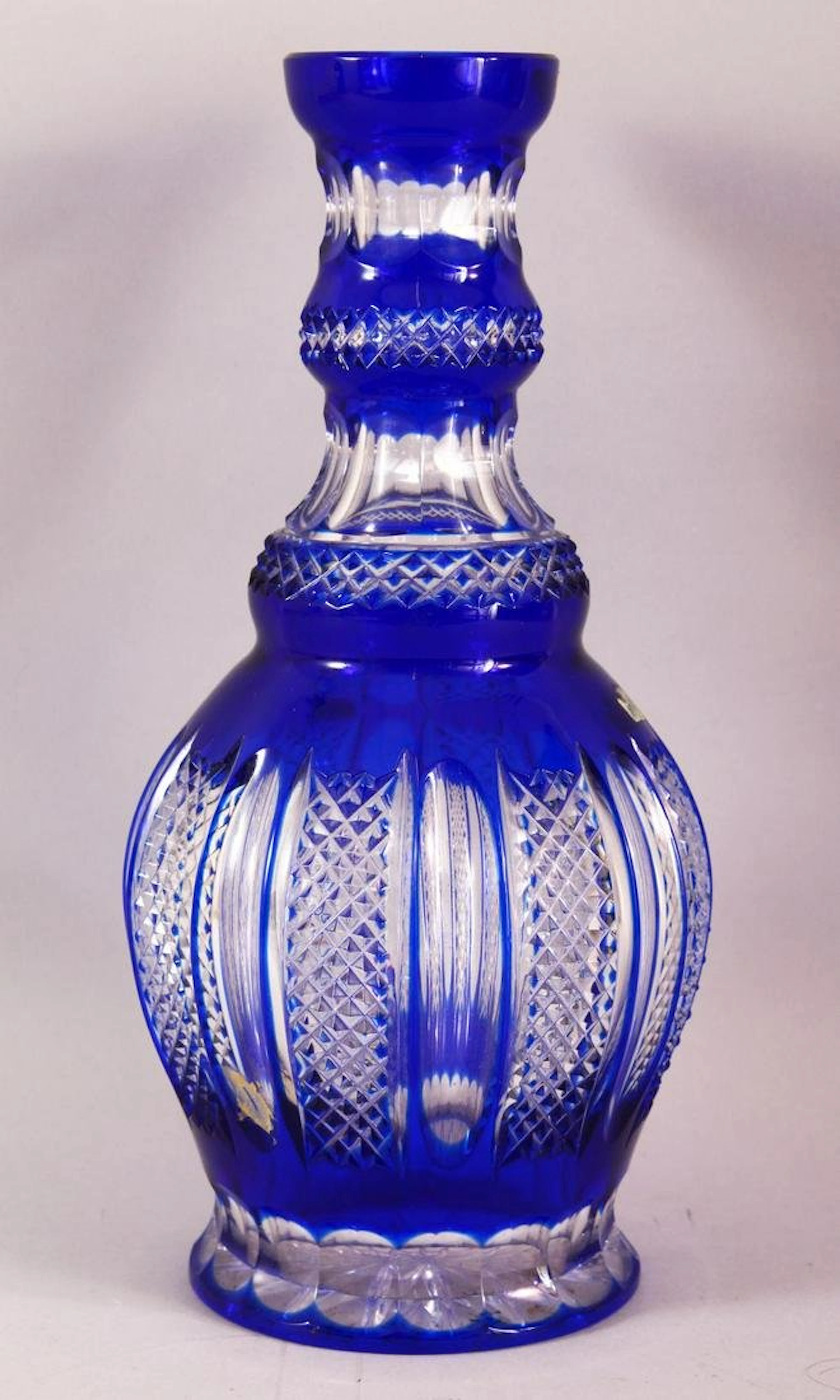 A LARGE ISLAMIC BLUE BOHEMIAN CUT GLASS HUQQA BASE,