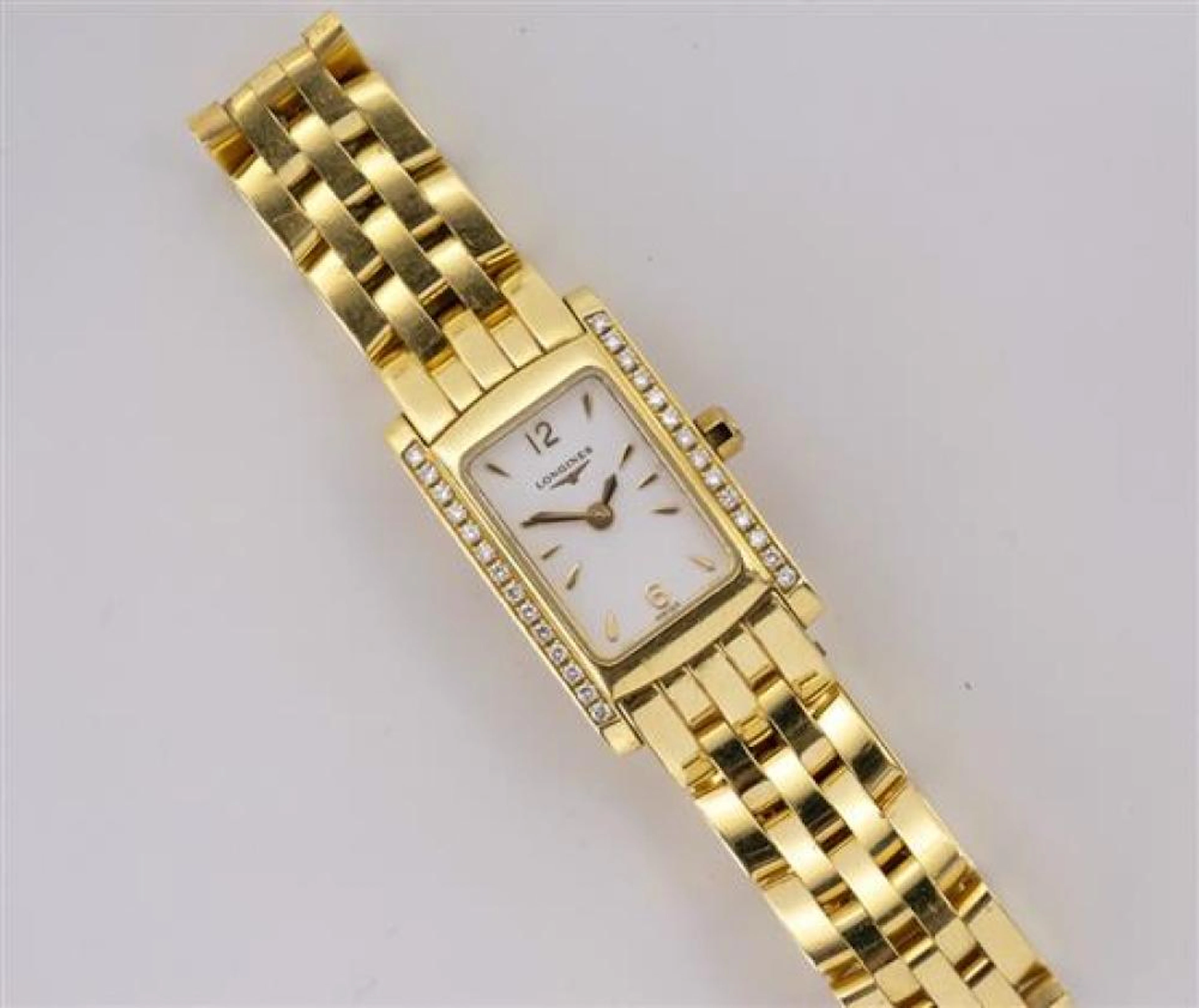 A ladies 18ct yellow gold and diamond Longines DolceVita wrist watch ref