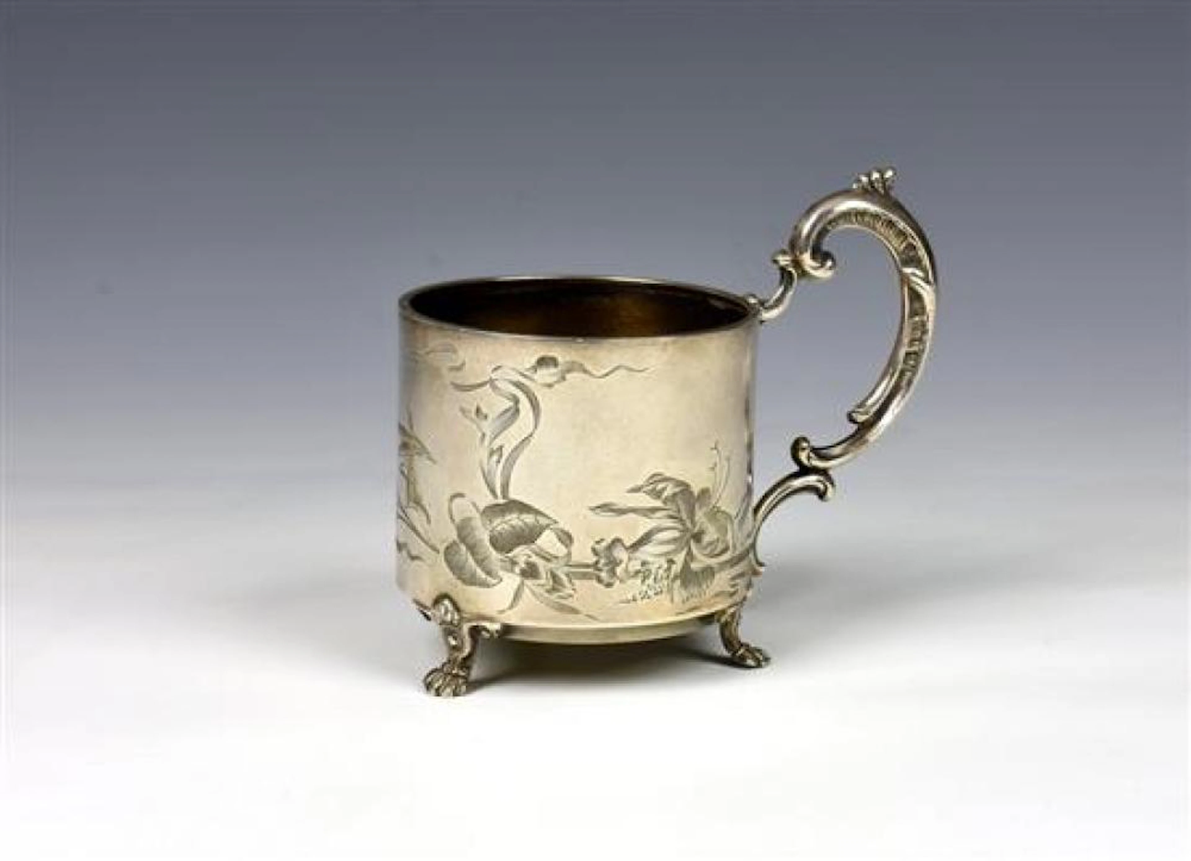 A Russian silver podstakannik (tea glass holder) probably late 19th century
