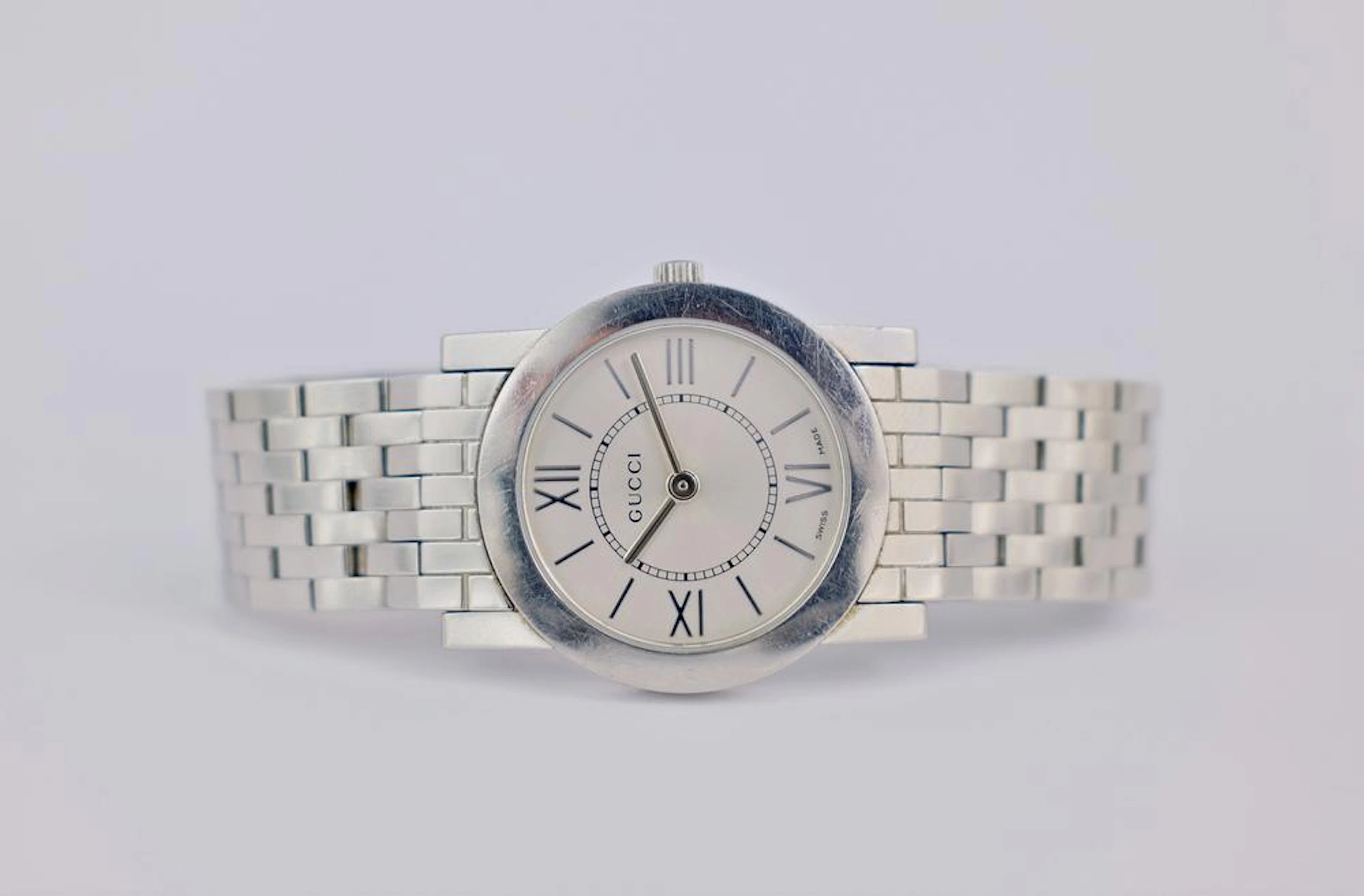A stainless steel Gucci watch the 27mm