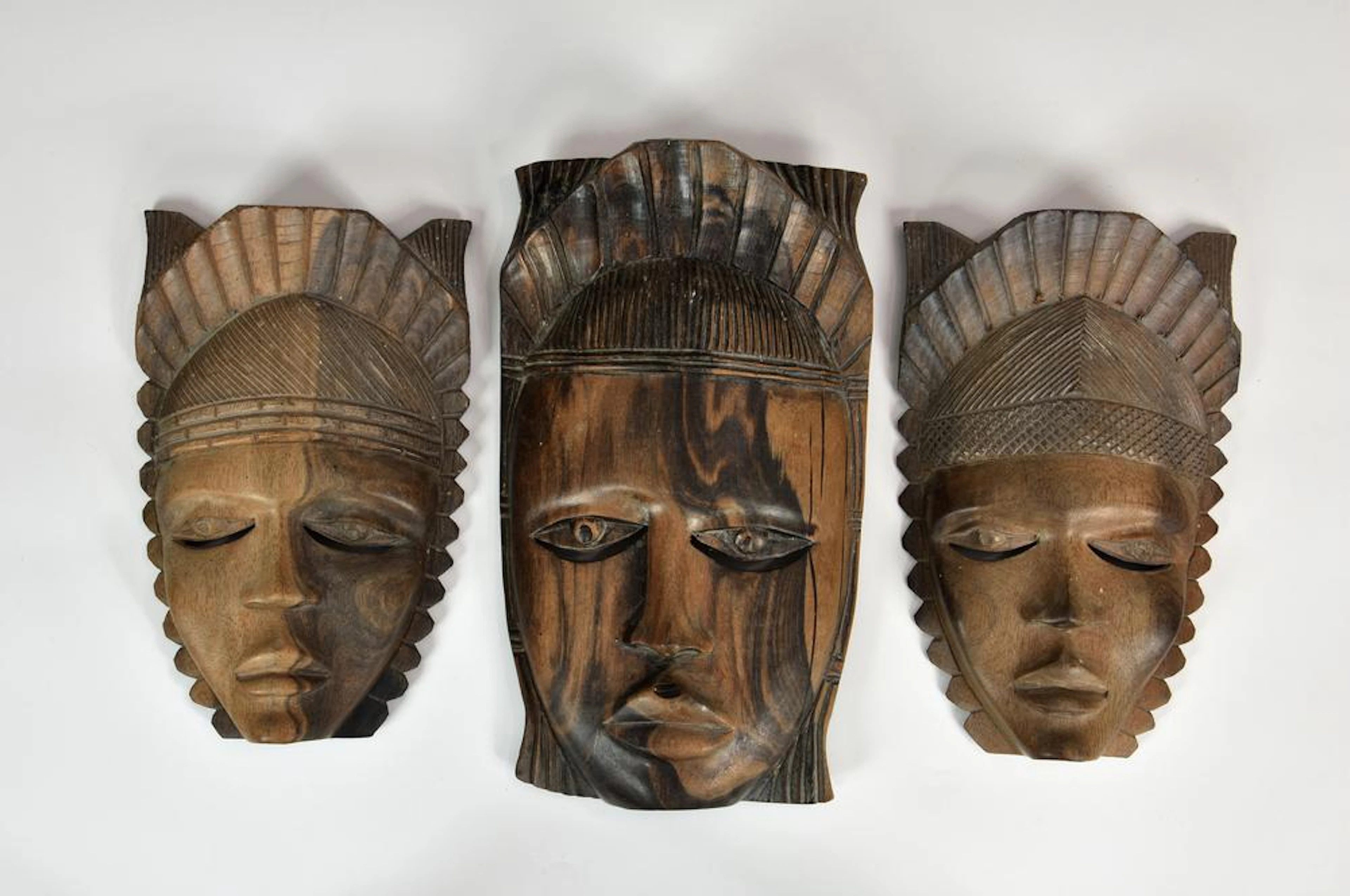 Tribal Art - a collection of three Nigerian tribal masks...