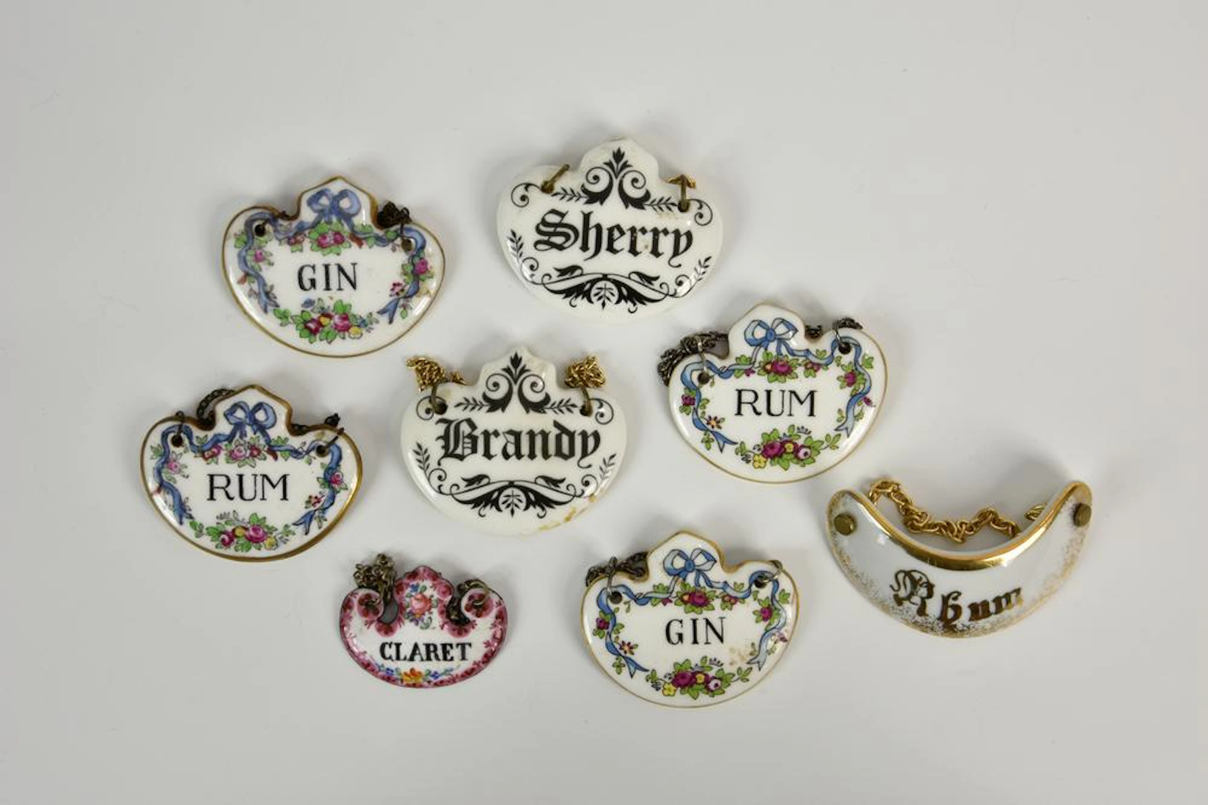 A small collection of eight bone china and enamel...