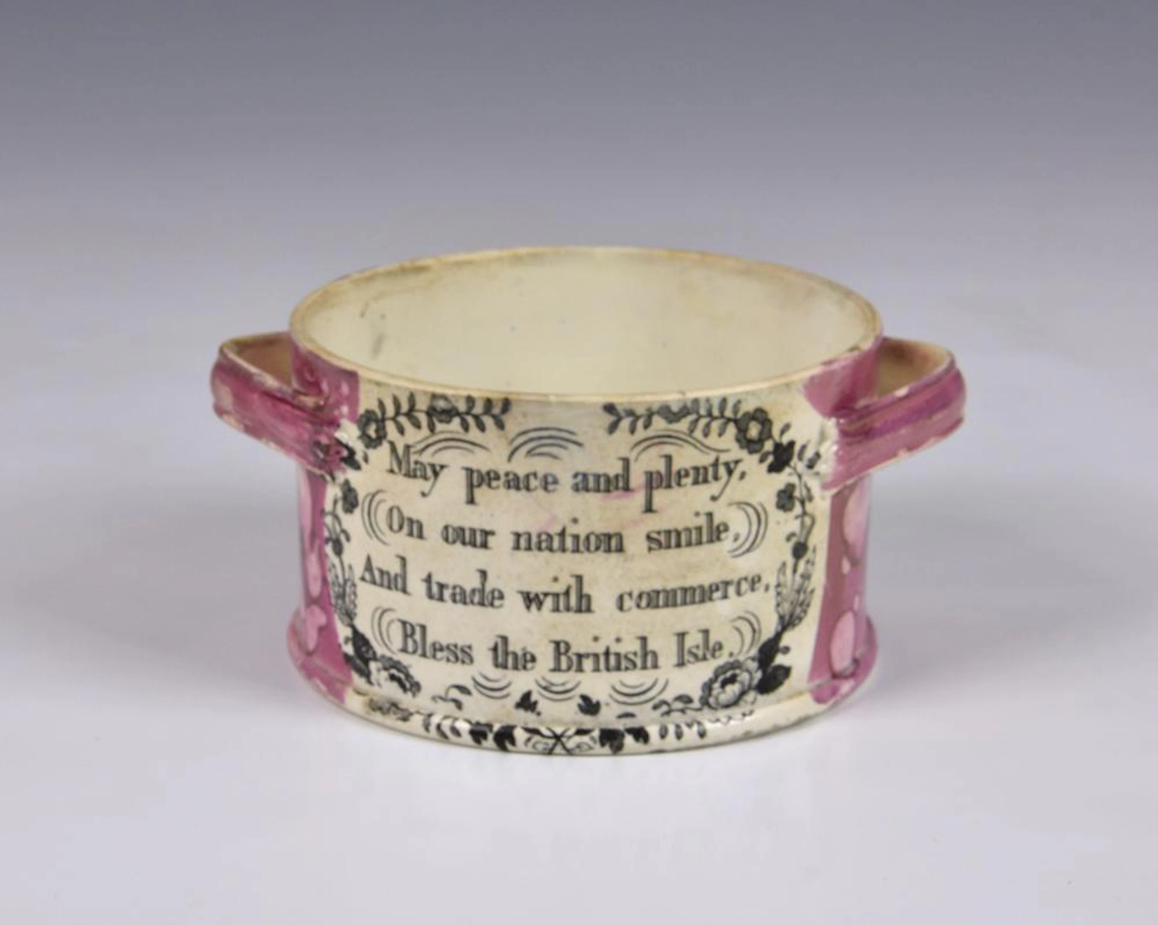 A rare Sunderland pink lustre bottle coaster painted and transfer printed,