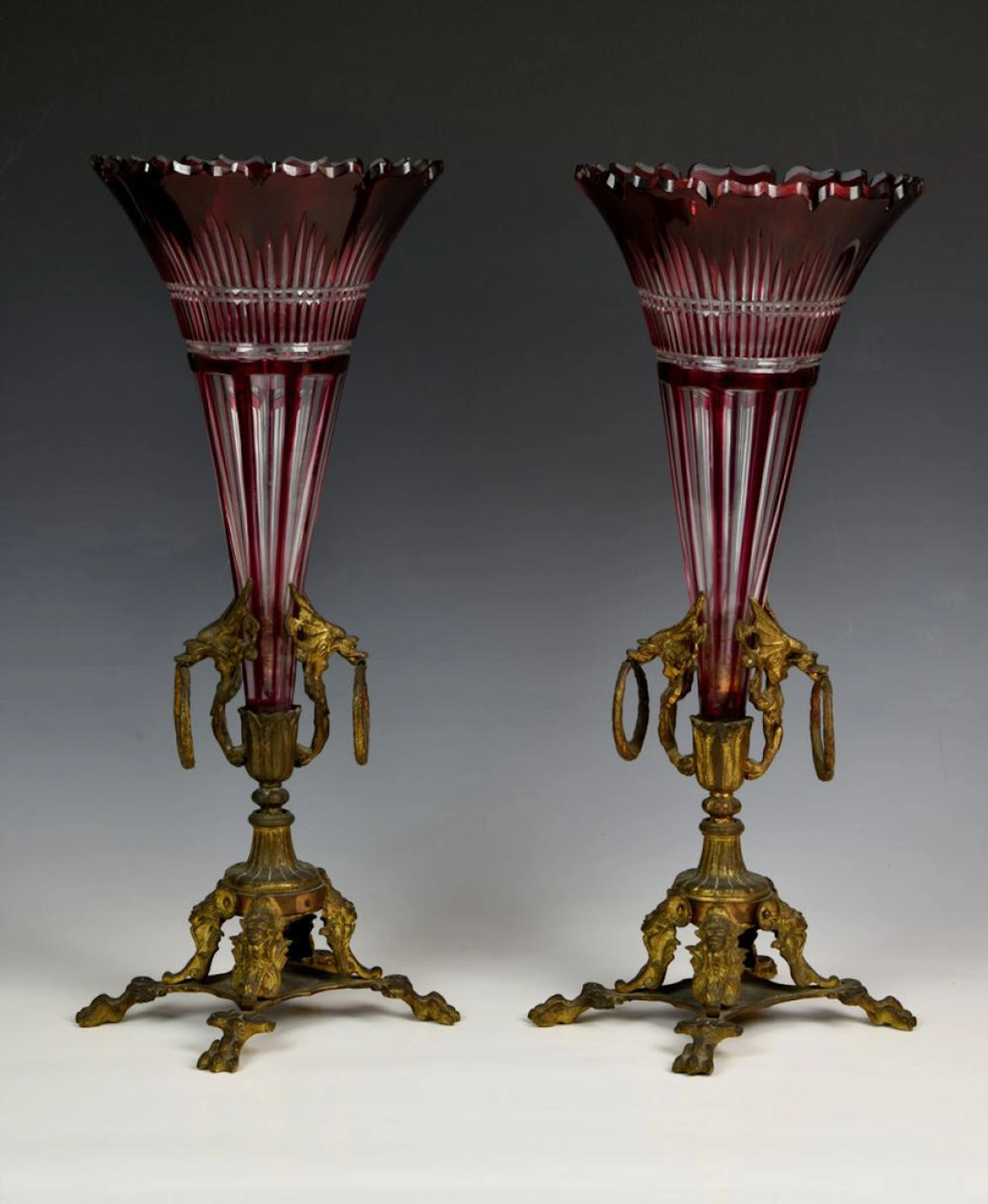 A pair of 19th century ruby cased glass and gilt metal...
