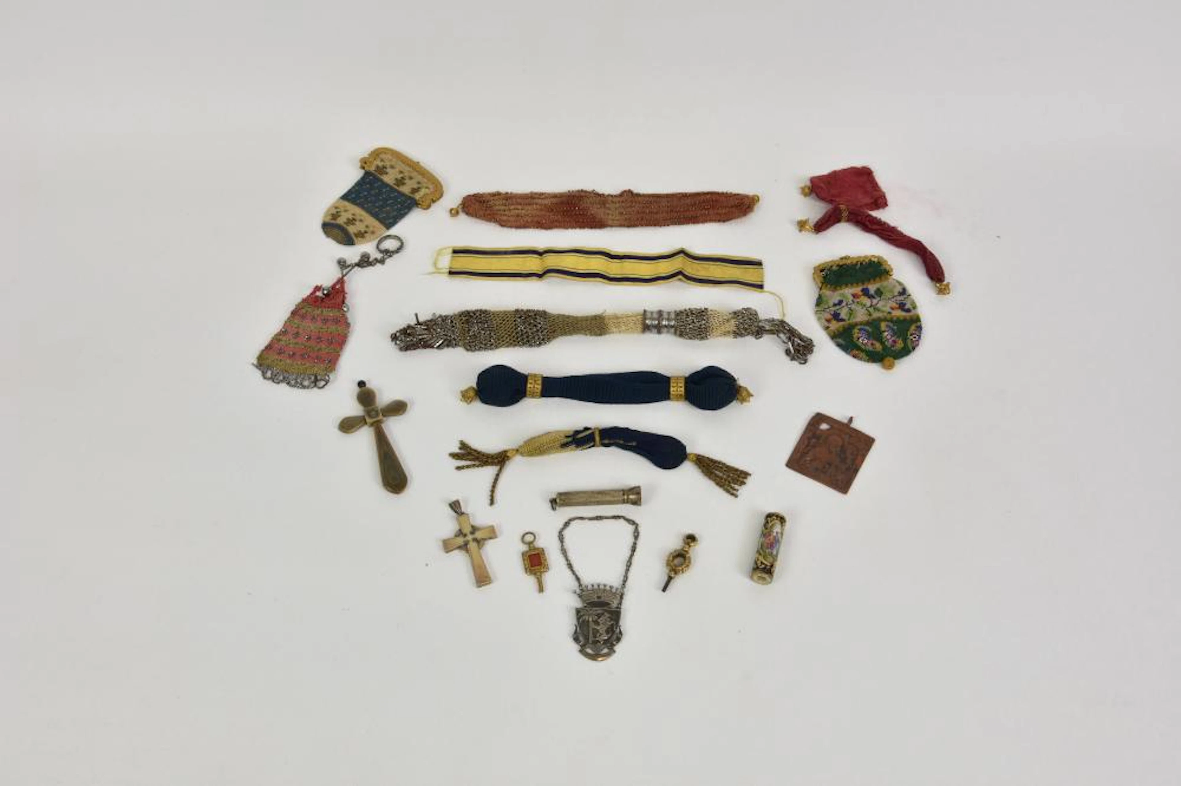 A collection of nine antique handmade sovereign purses
