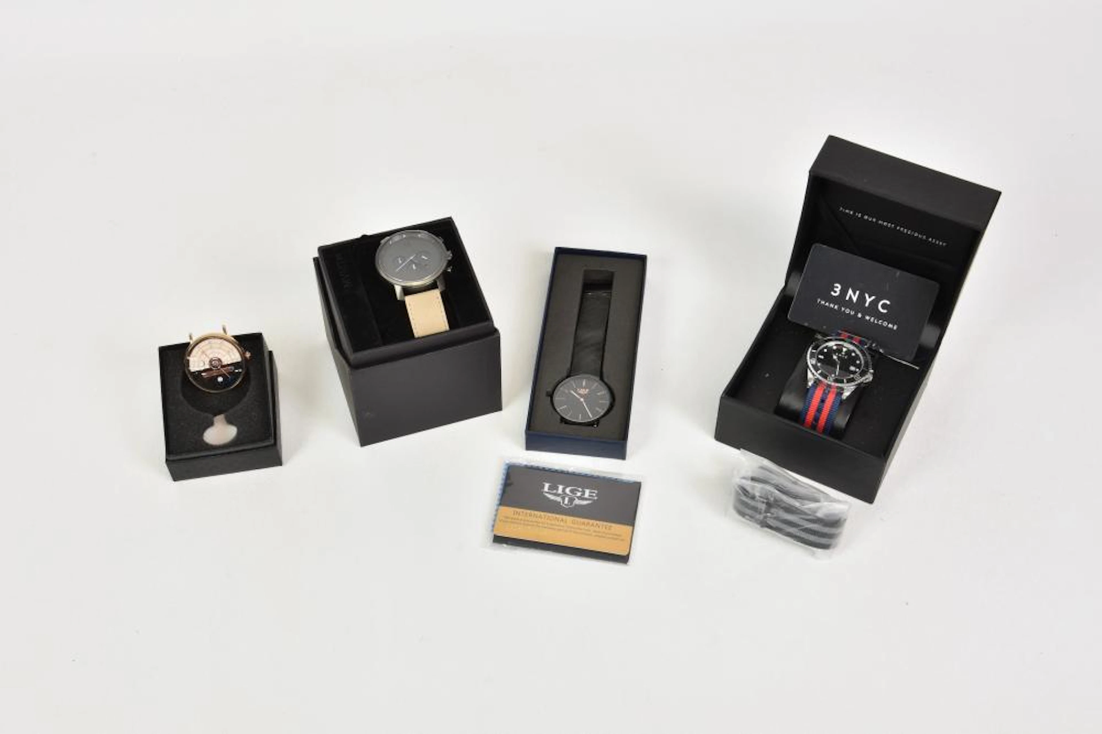 Four gents dress watches by MVMT, 3 NYC, Lige and Dom Original