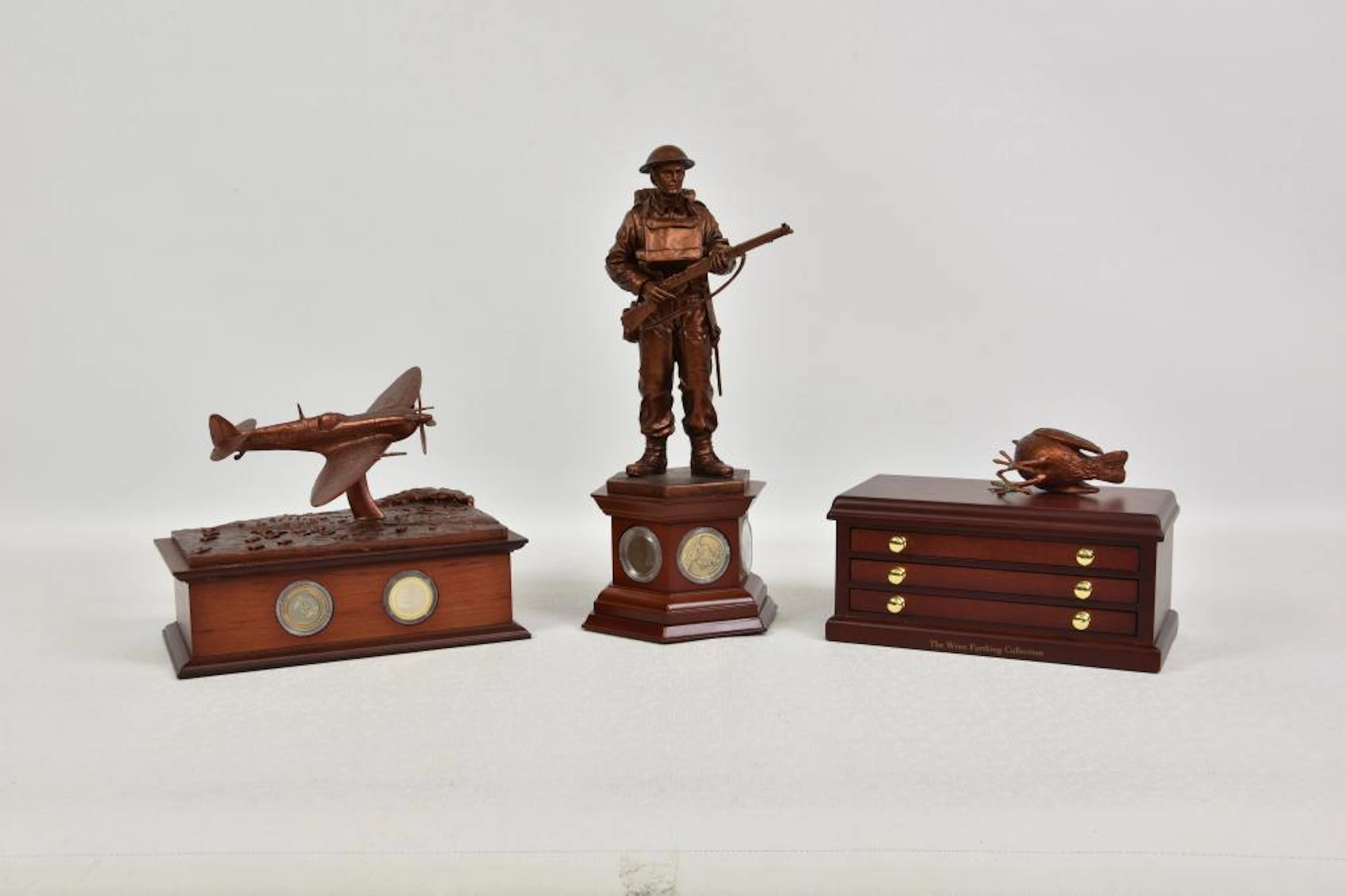 Danbury Mint "The Defender" painted resin sculpture on wooden plinth