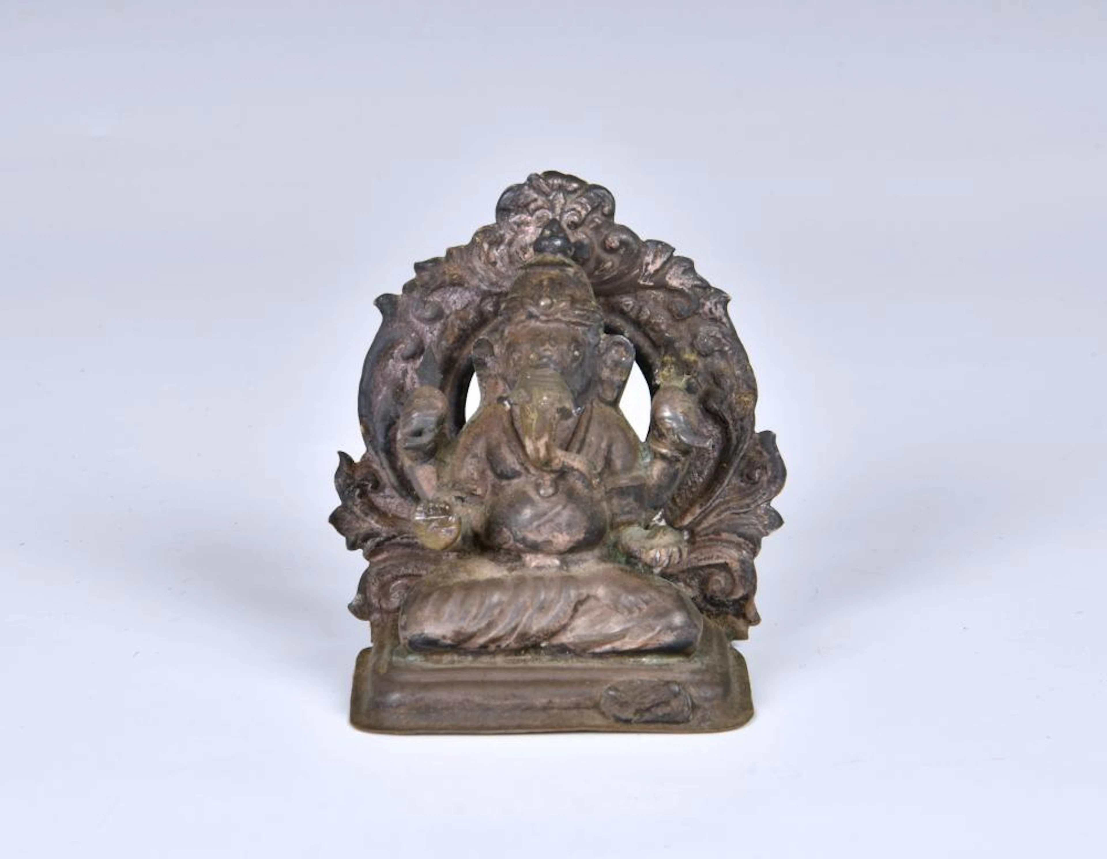An Indian white metal model of Ganesh