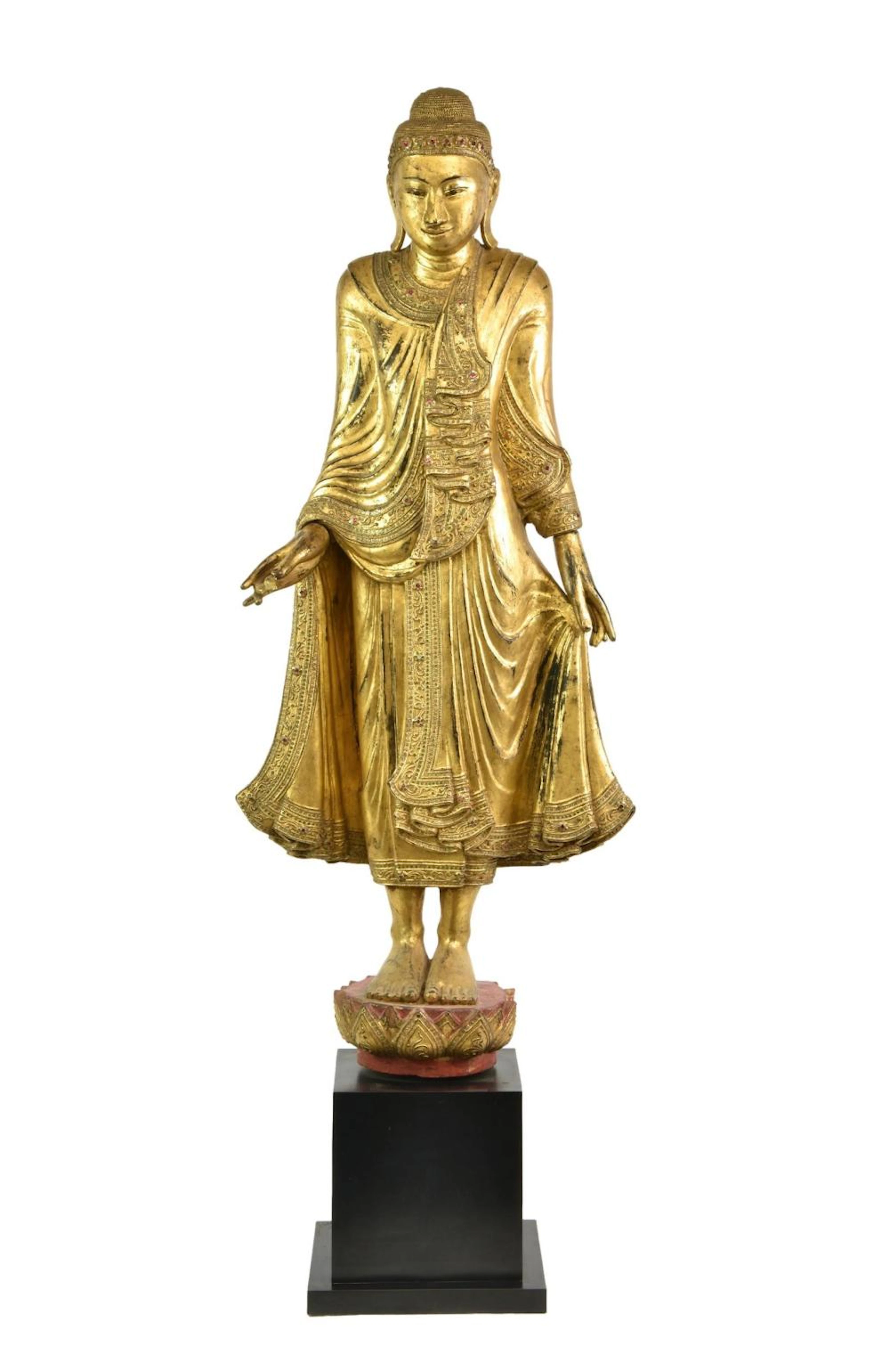 A Burmese giltwood and jewelled figure of the standing Buddha