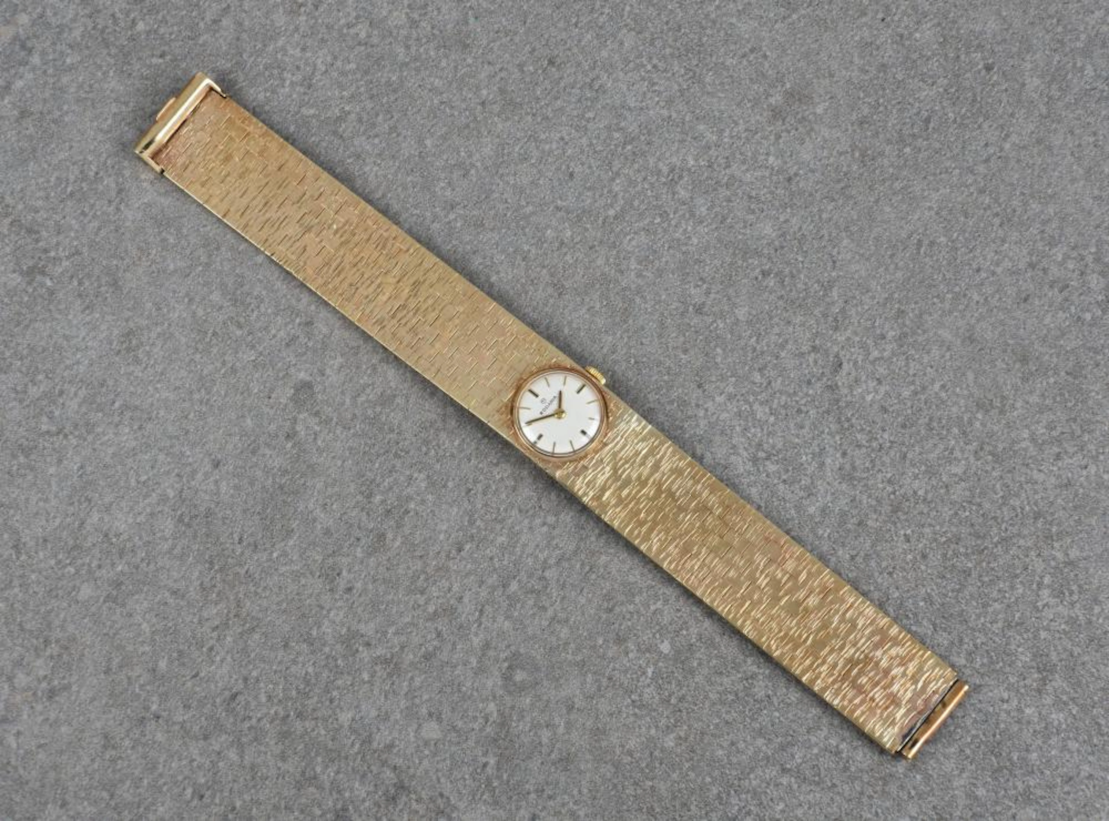 A vintage 9ct gold ladies Rodania manual wind bracelet watch