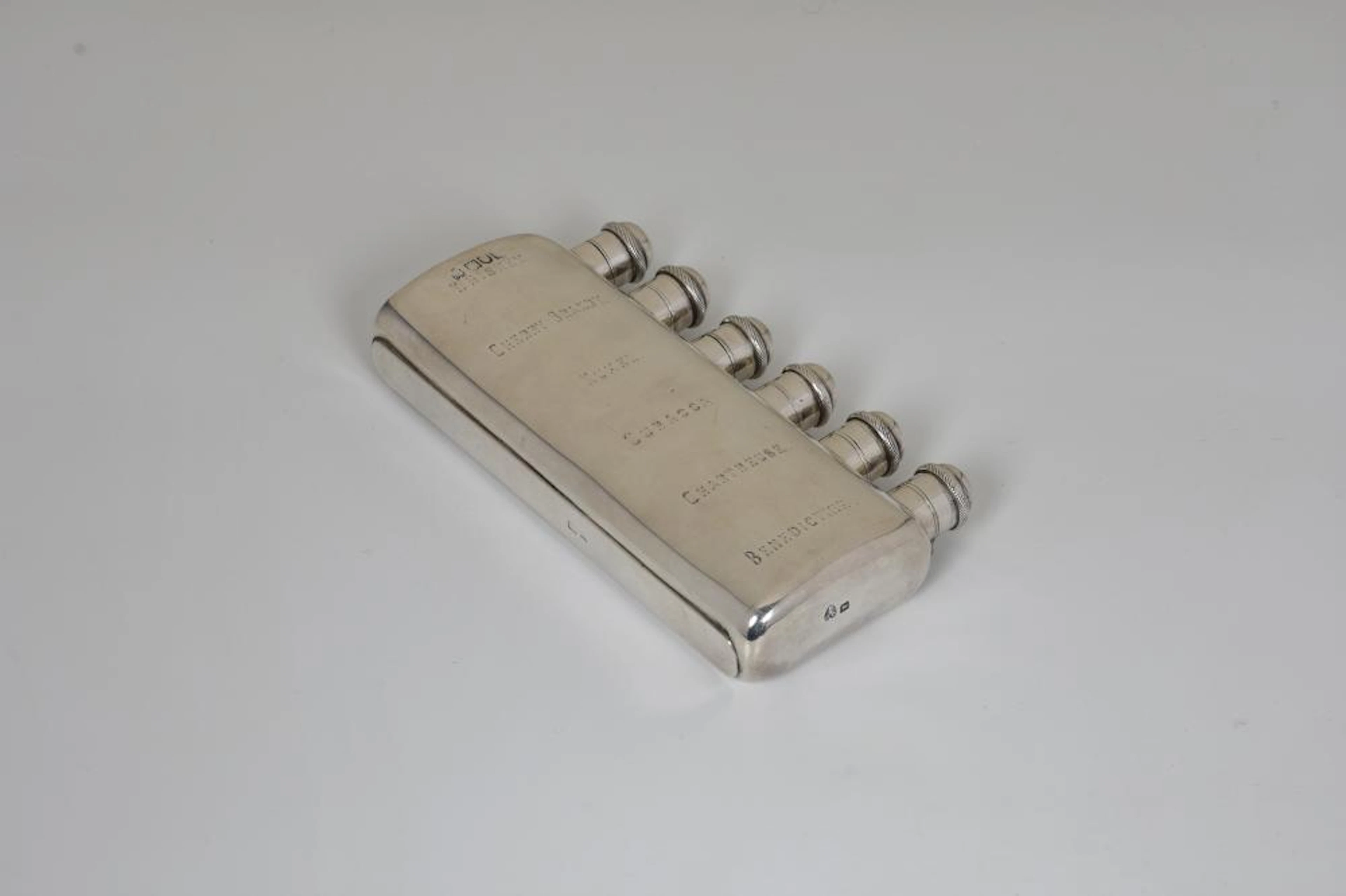 An unusual and extremely rare Edwardian silver hip flask