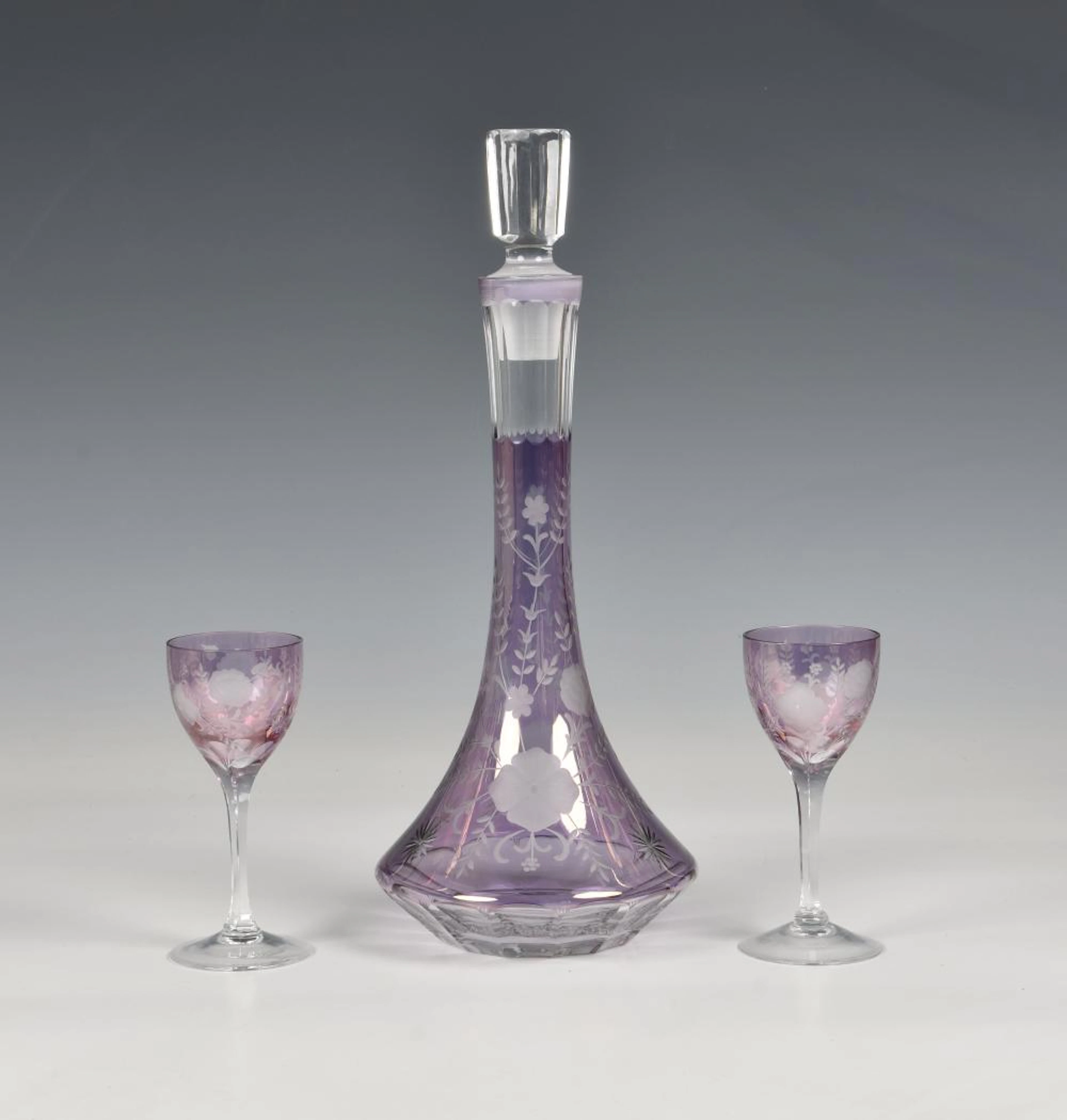 A De Lamerie of London presentation purple glass decanter and two sherry glasses