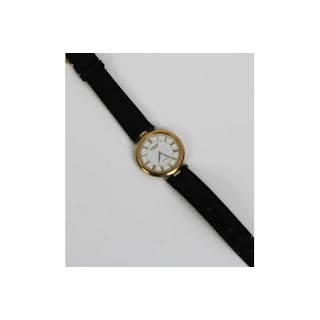 A Raymond Weil Geneve gold plated quartz watch black leather strap