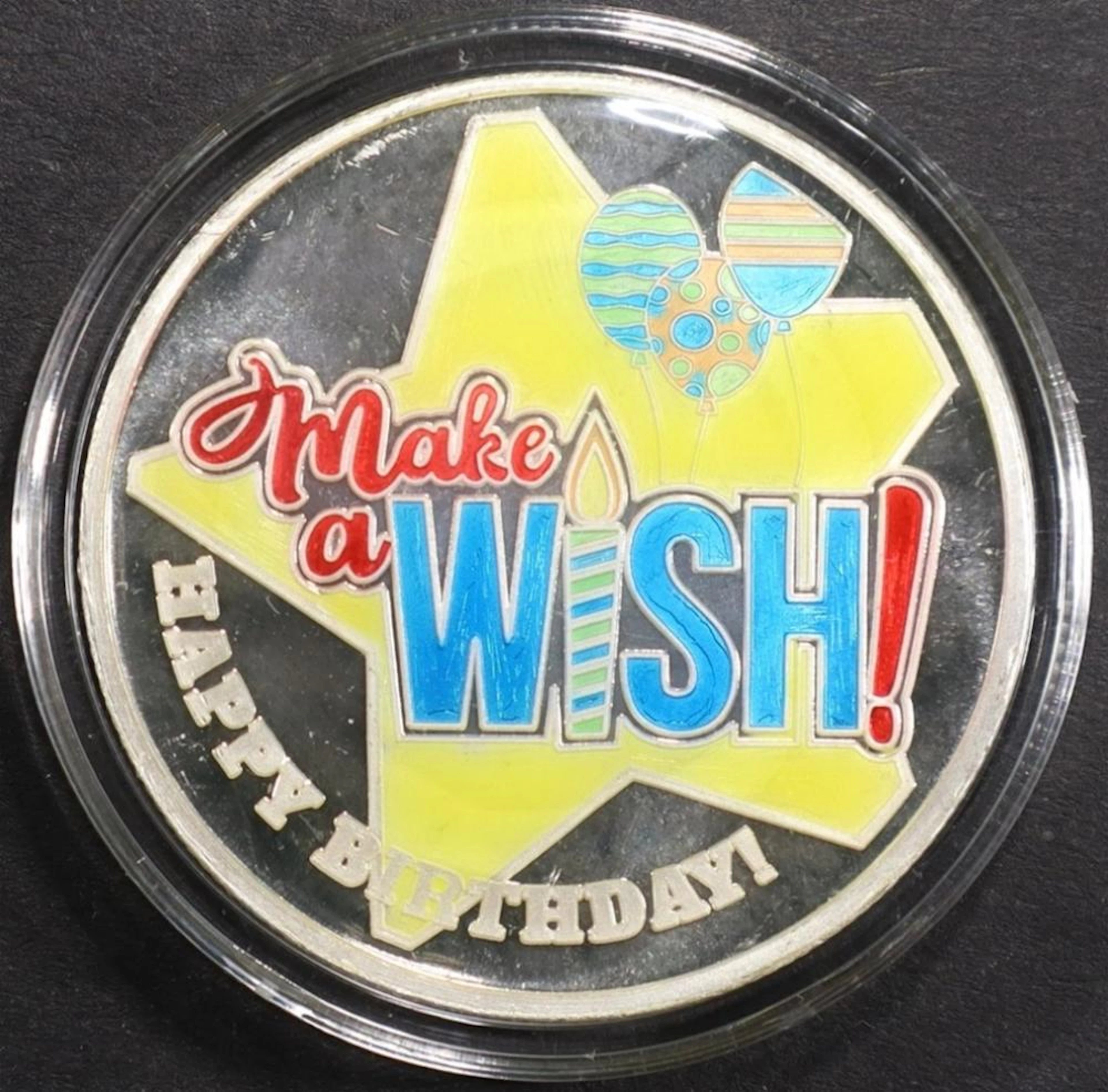 ONE OZ . 999 ENAMELED MAKE A WISH SILVER ROUND