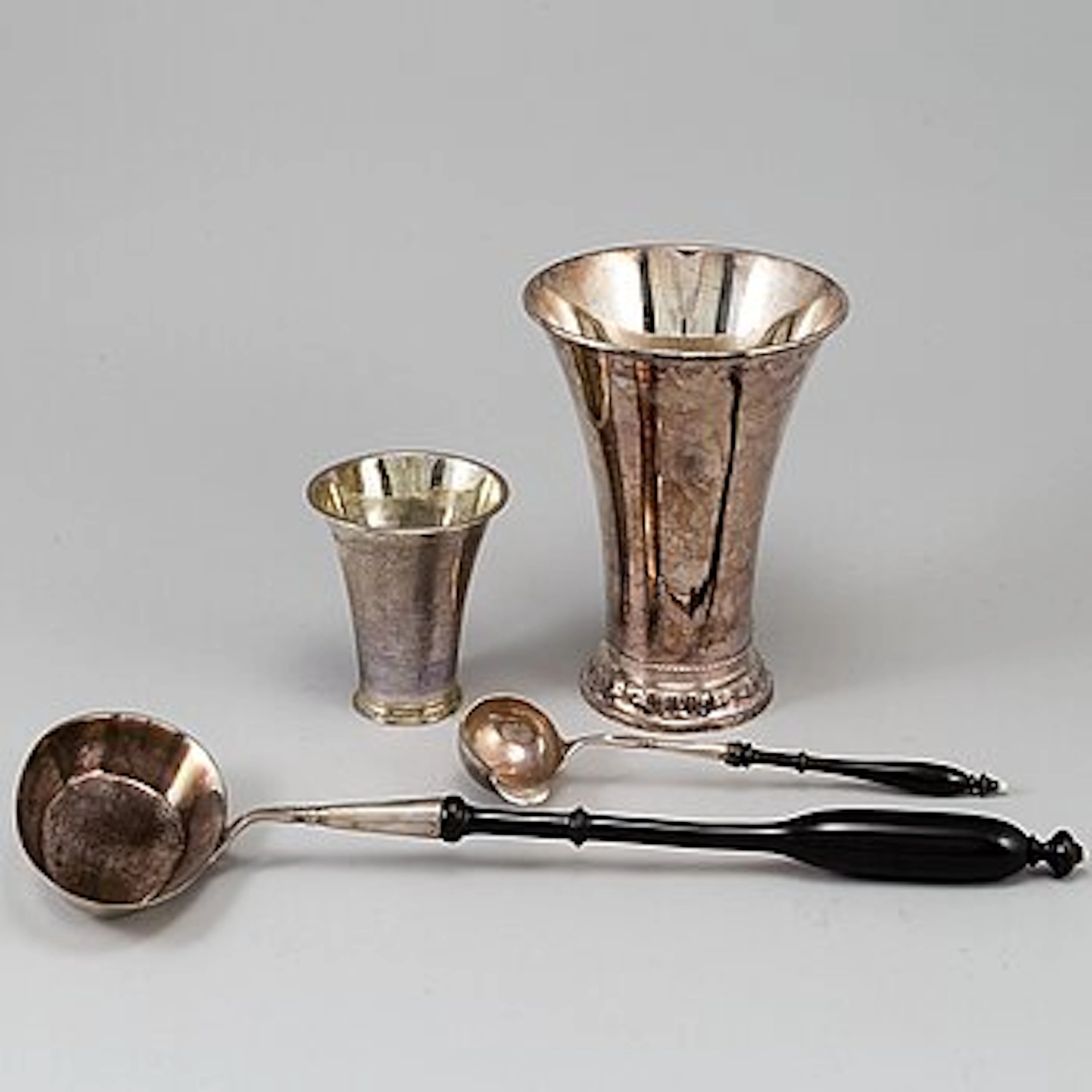 One sauceladel, one soupladel and 2 silver beakers, one by Anna Dorothea
