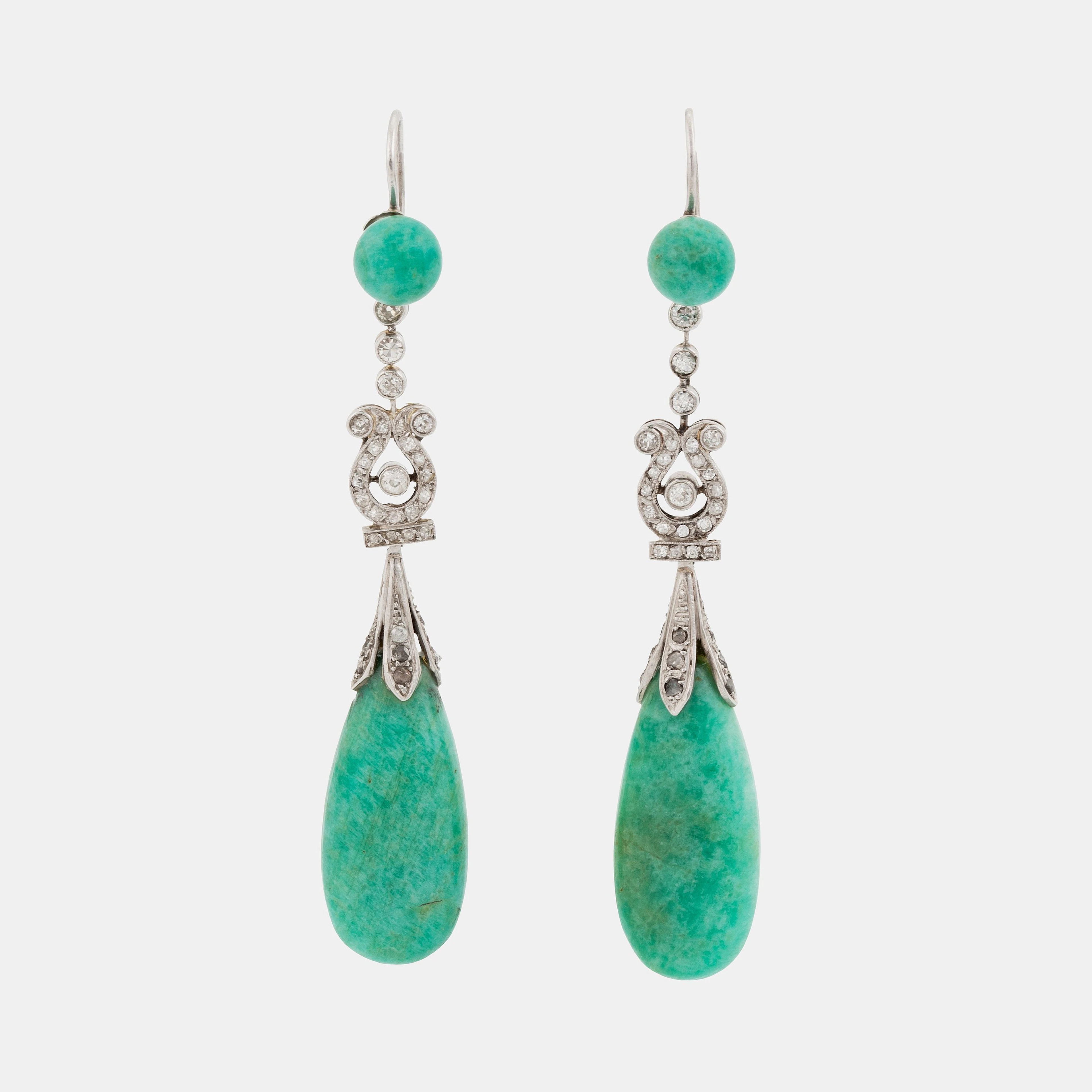A pair of platinum earrings with amazonite