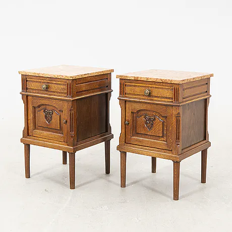 A pair of oak bedside tables first half of the 20th century. | Barnebys