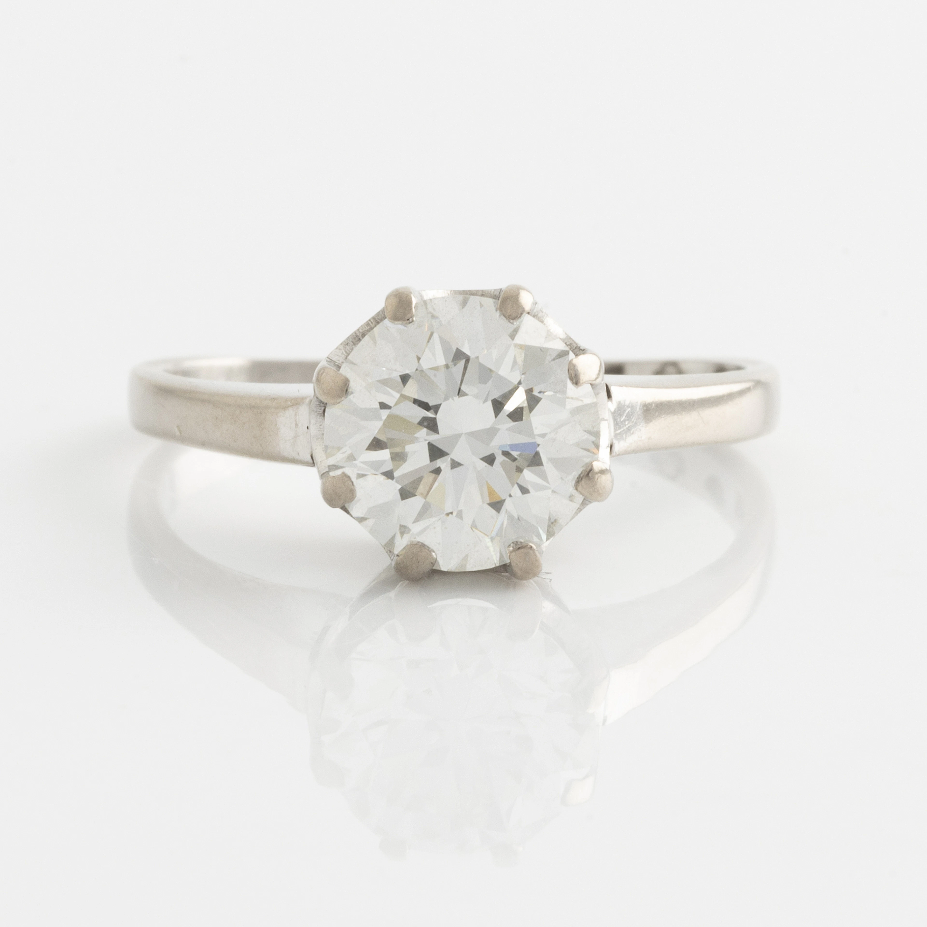 Ring, white gold with brilliant-cut diamond.