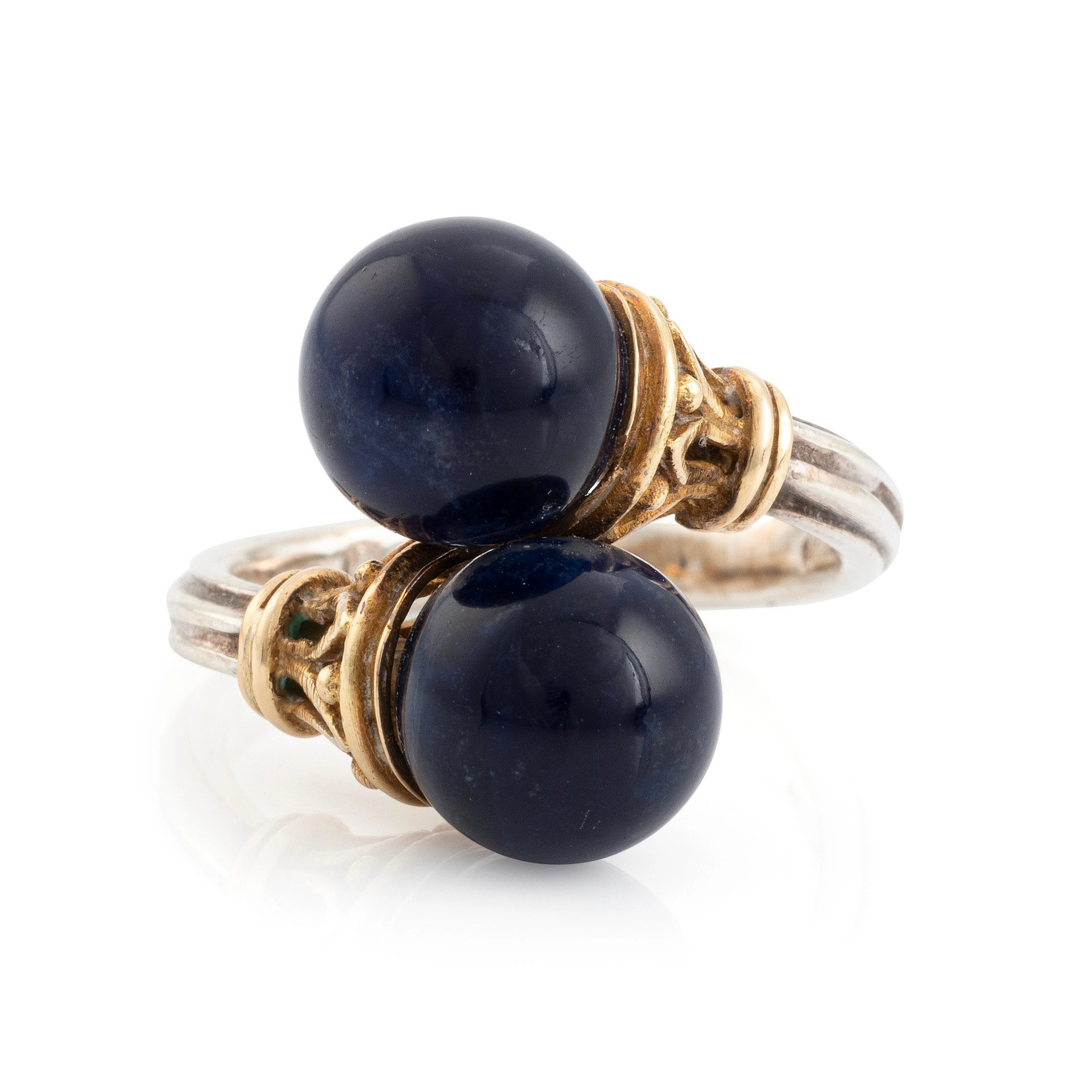 An Ilias Lalaounis ring in silver and 18K gold with sodalite