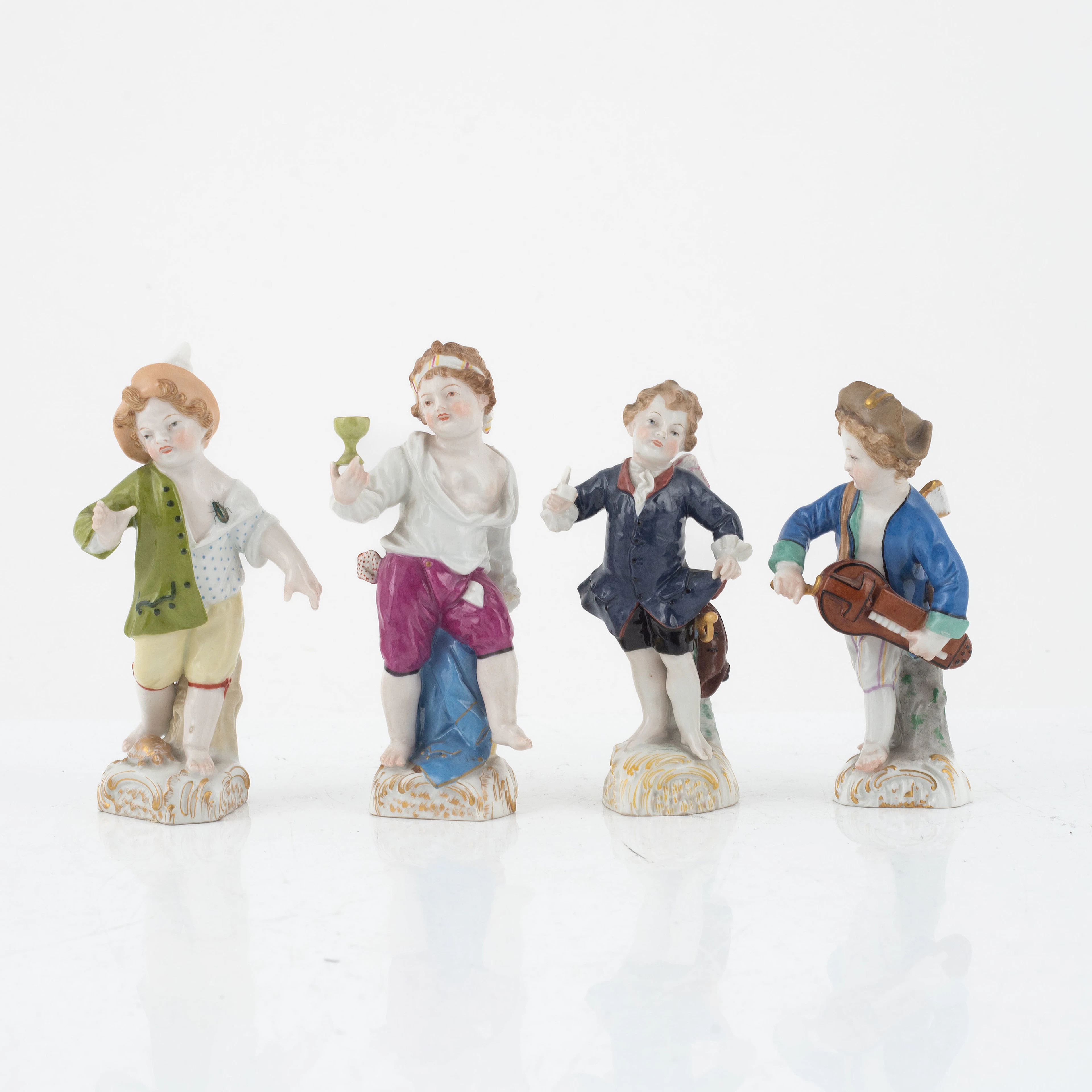 Fou rporcelain figurines, Königliche Porzellan-Manufaktur, Berlin, 19th century.